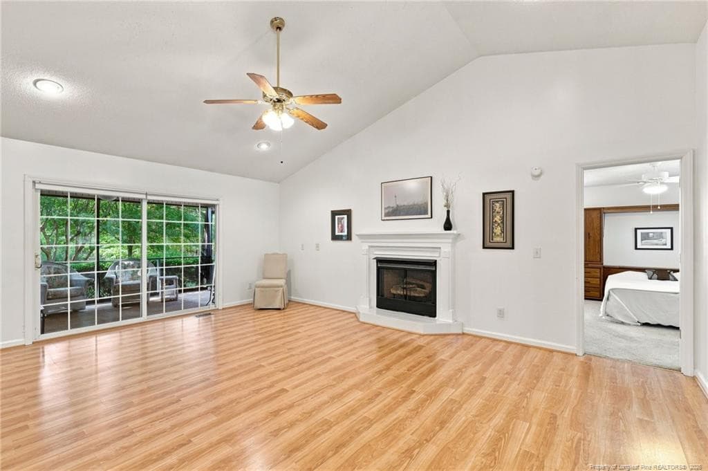living room with vaulted ceilings - 137 Winsford Circle, West End, NC 27376, West End