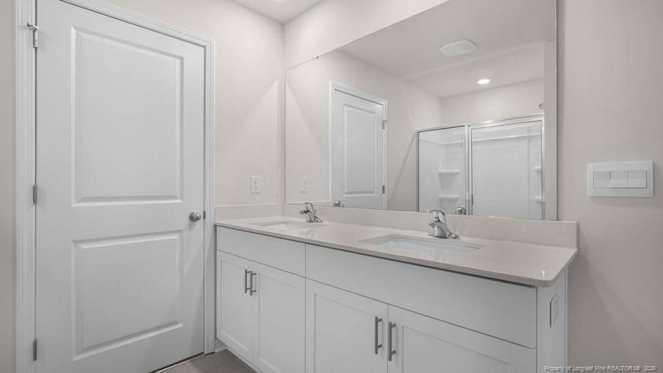PRIMARY SUITE BATHROOM - 672 Wilder Bloom Path, Aberdeen, NC 28315