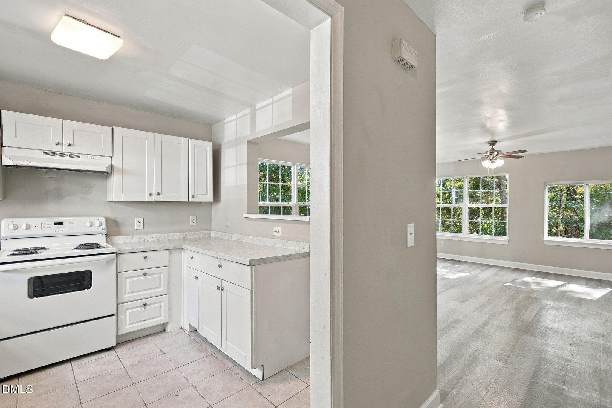 Kitchen flows to living room - 320 Kilarney Drive, Durham, NC 27703, Durham