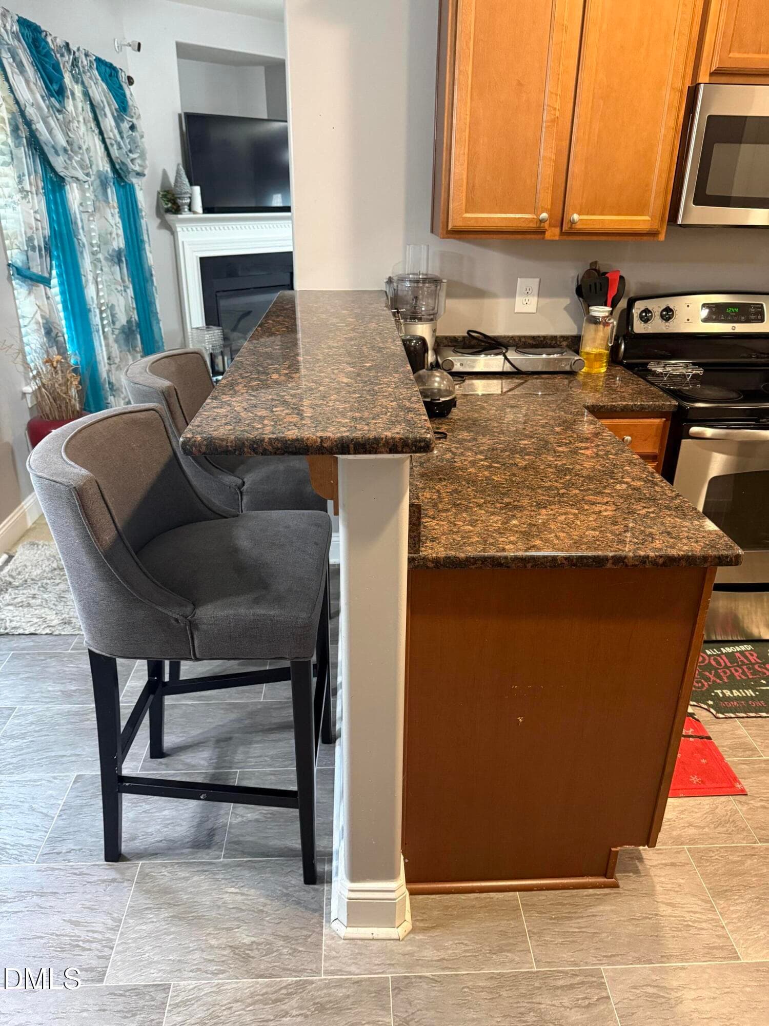 Island with chairs - 1164 Phelps Court, Creedmoor, NC 27522, Creedmoor