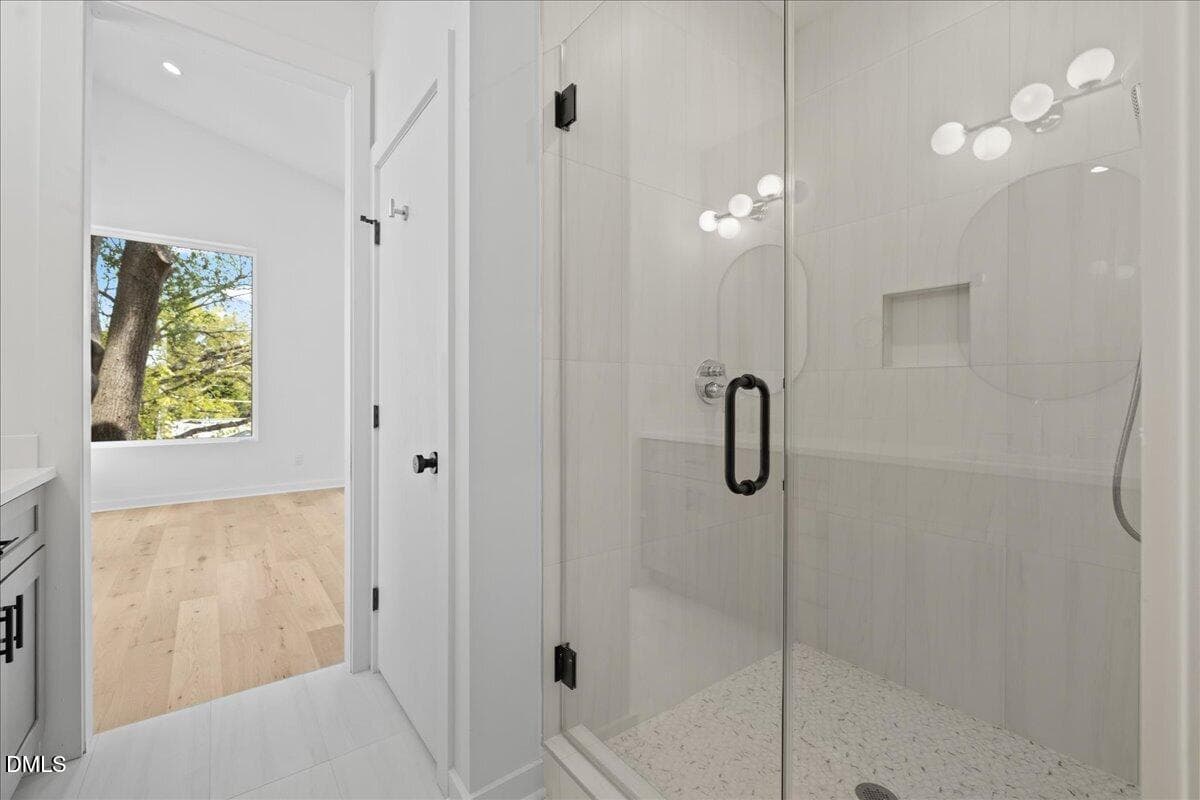 Large tiled walk-in shower - 804 Cotton Place 102, Raleigh, NC 27601
