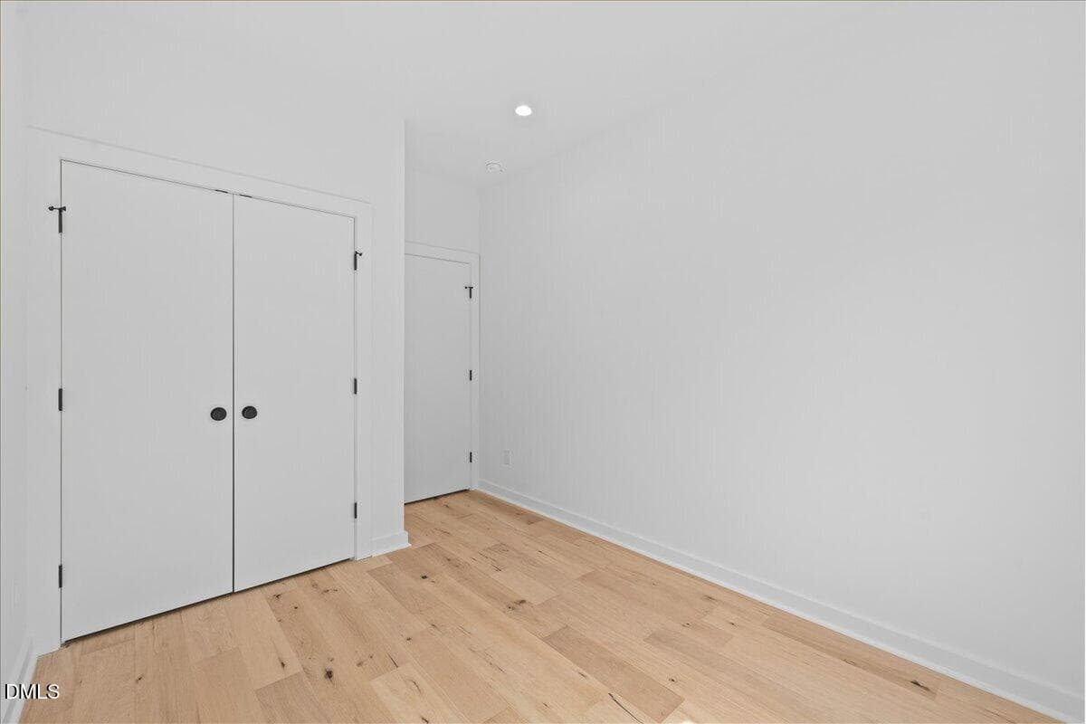 Hardwoods throughout the upper level - 804 Cotton Place 102, Raleigh, NC 27601