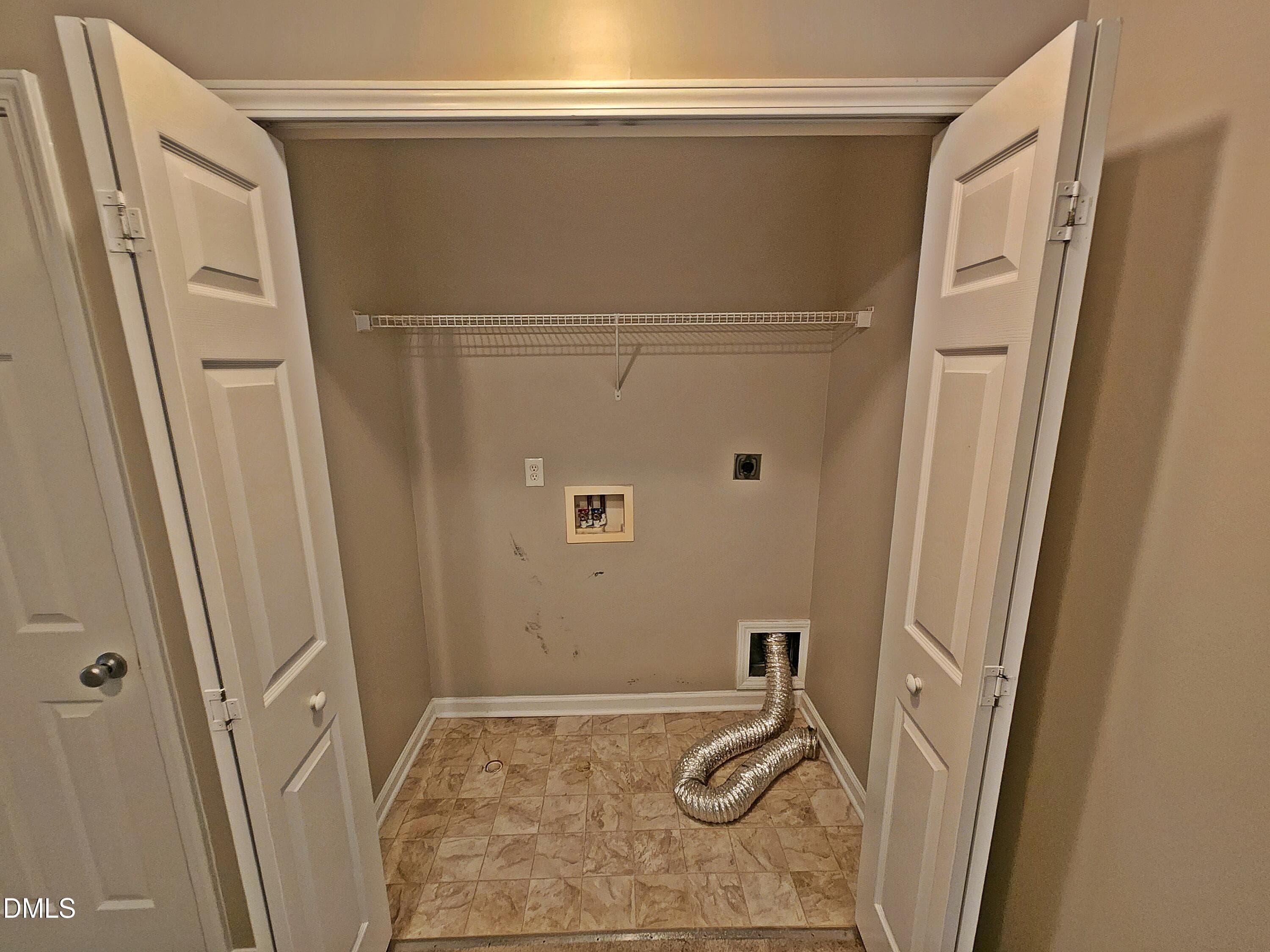 laundry closet - 8475 Reedy Ridge Lane, Raleigh, NC 27613