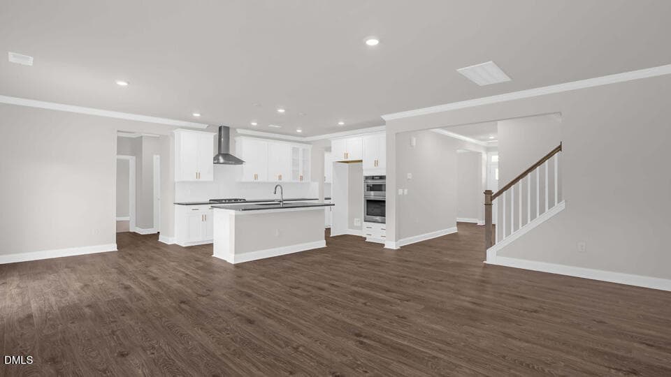 BREAKFAST AREA, FAMILY ROOM, AND KITCHEN - 2337 Horton Park Drive, Apex, NC 27539