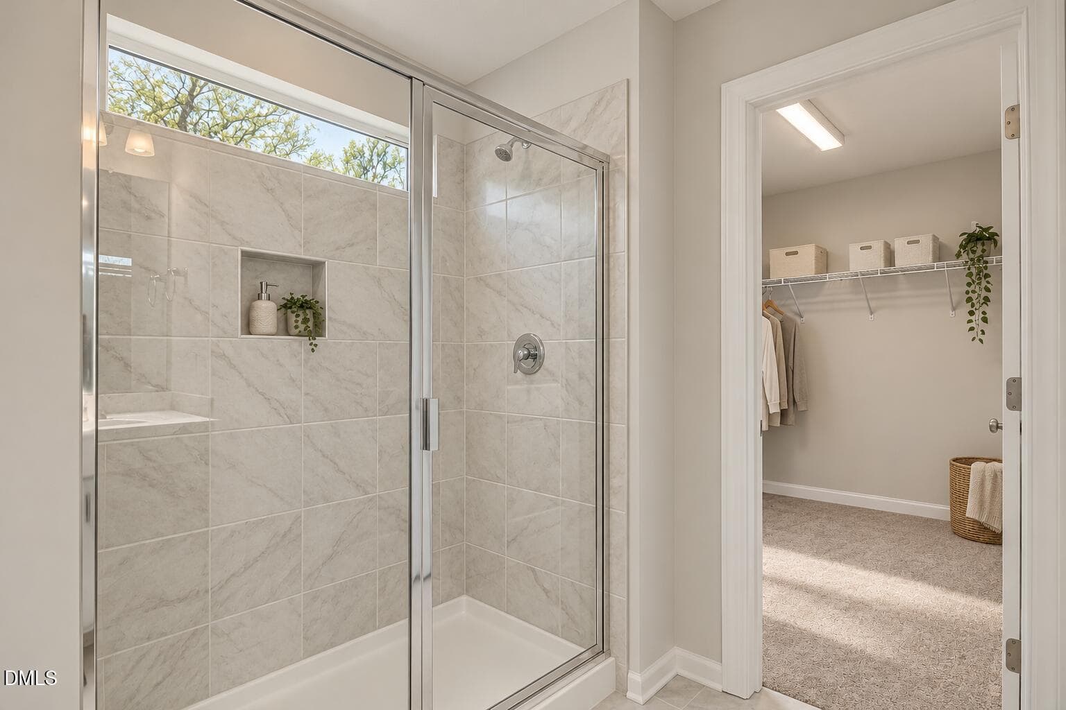 Marble-Tile Primary Bathroom and Closet - 224 Starlet Ridge Way, Clayton, NC 27520