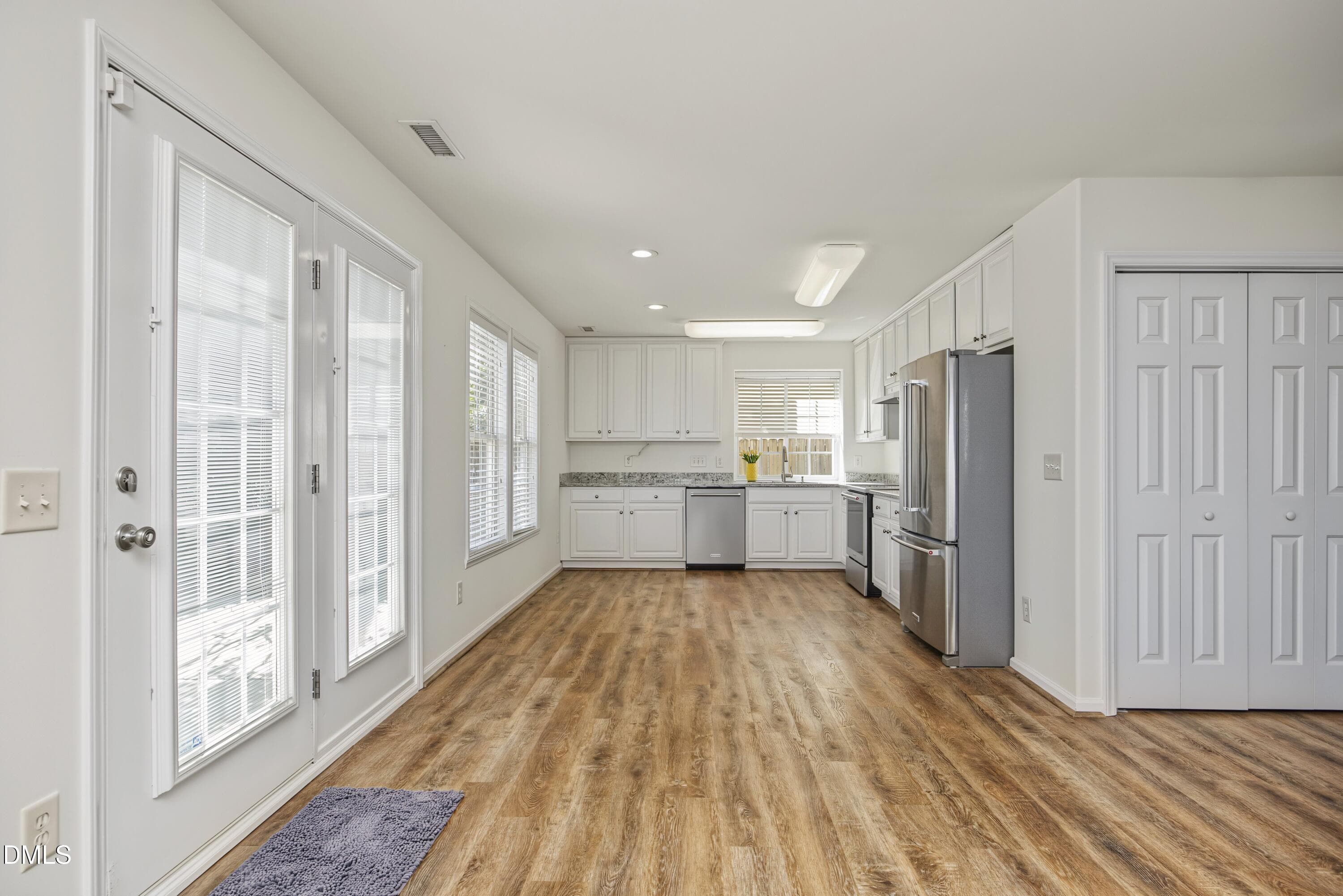 Kitchen w/ LVP flooring - 1529 Pebble Creek Crossing, Durham, NC 27713
