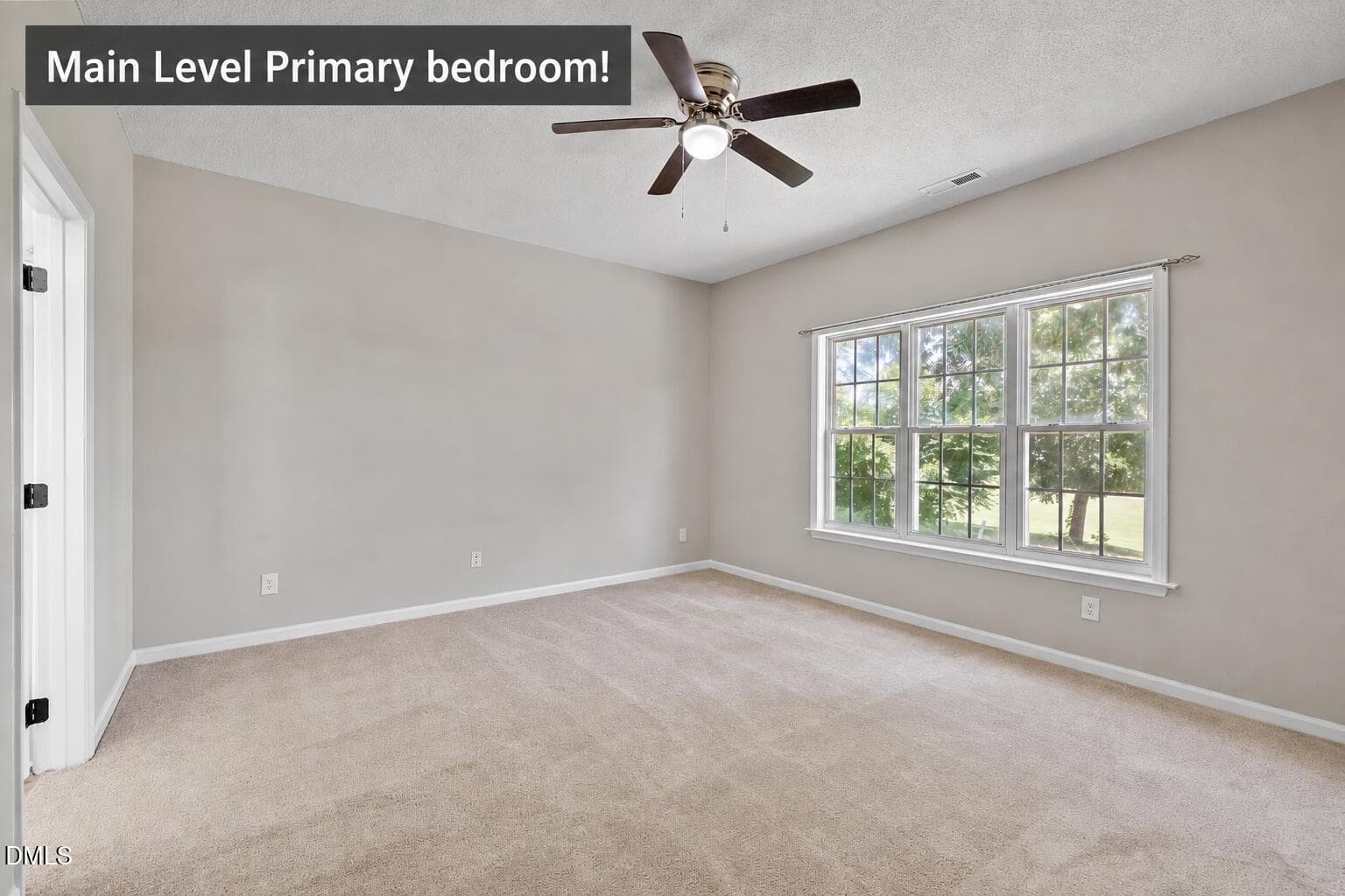 Main level primary bedroom - 2120 Castle Pines Drive, Raleigh, NC 27604
