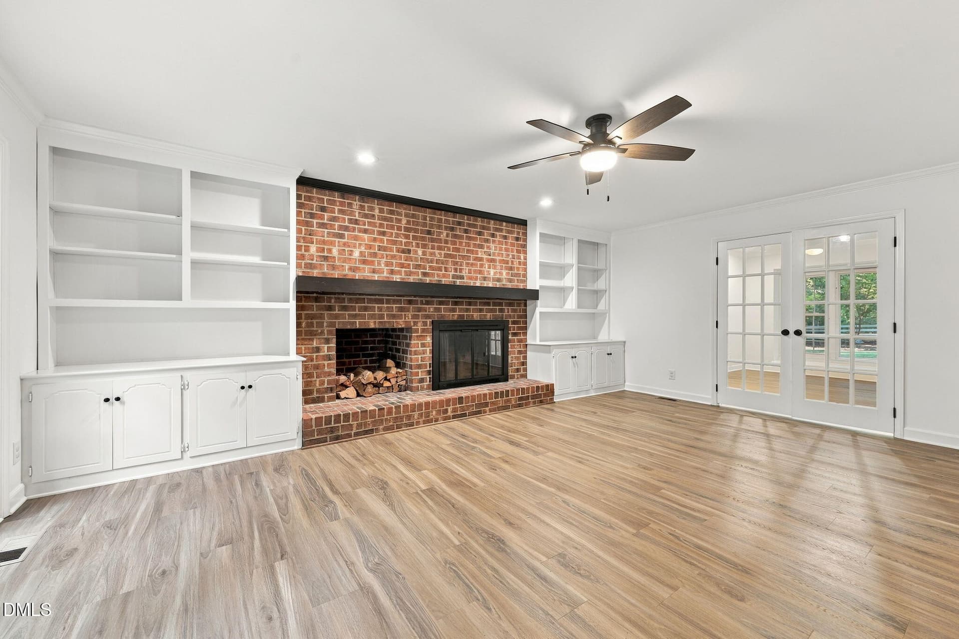 Family room fireplace - 11413 Old Creedmoor Road, Raleigh, NC 27613