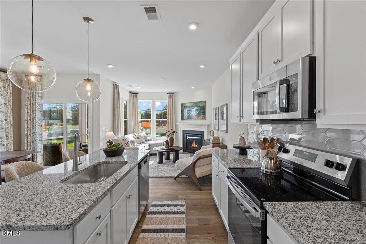 12-hhhunt-homes-whitfield-kitchen-white- - 107 Rolesville Ridge Drive, Rolesville, NC 27571