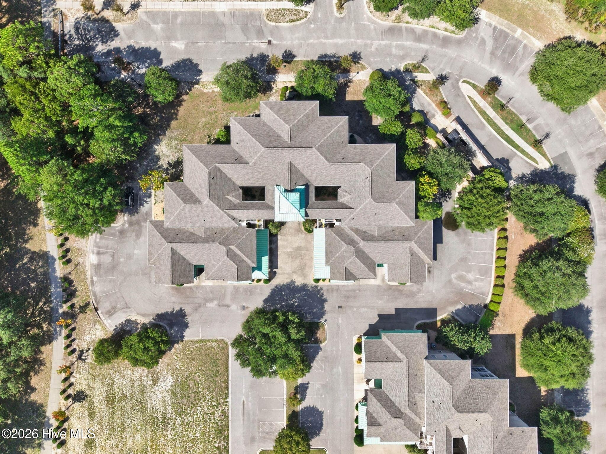 Aerial view of the community of Village Park Condominiums - 7825 High Market Street #303, Sunset Beach, NC 28468