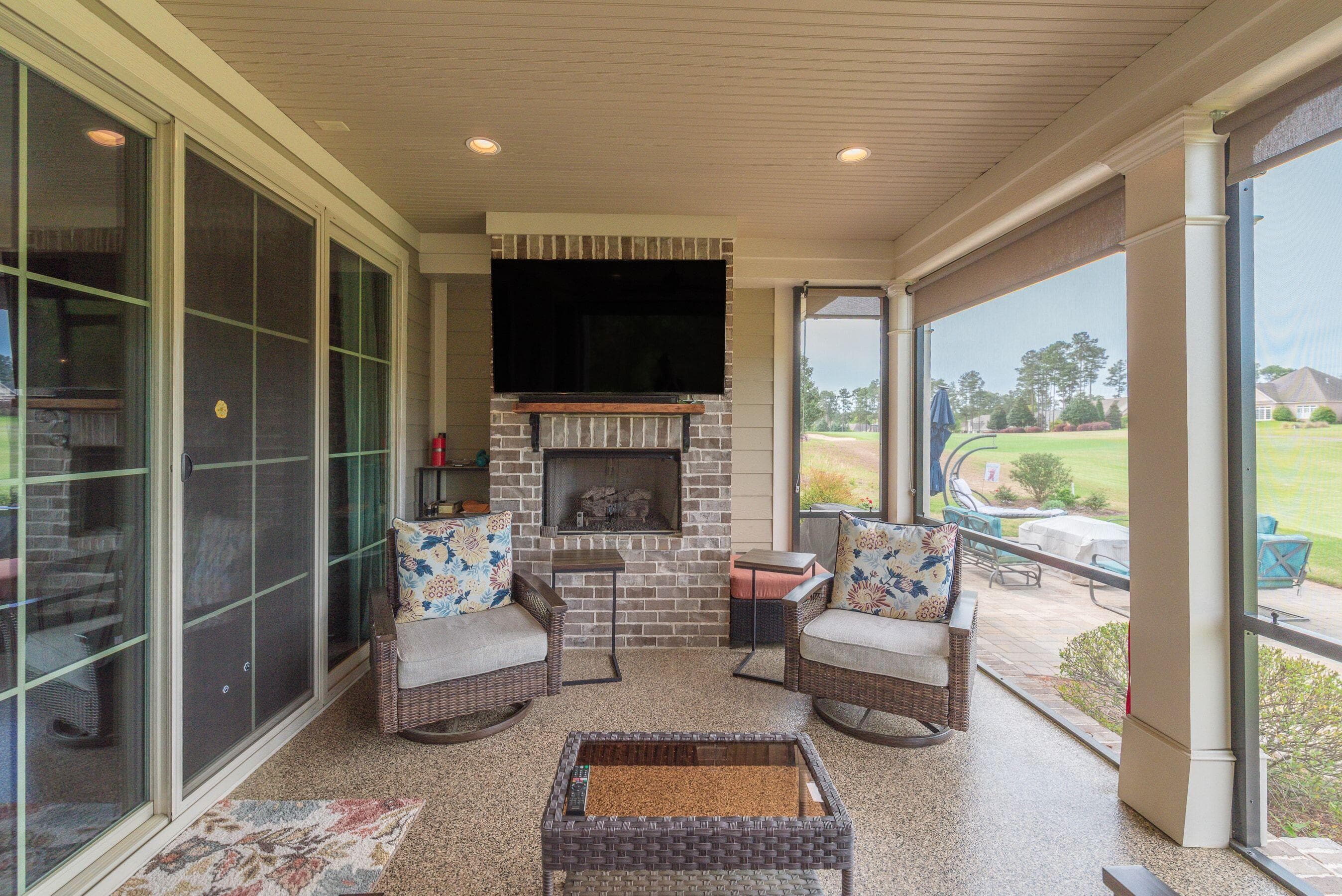 Screened porch with sitting area - 207 Quiet Oak Court, Aiken, SC 29803