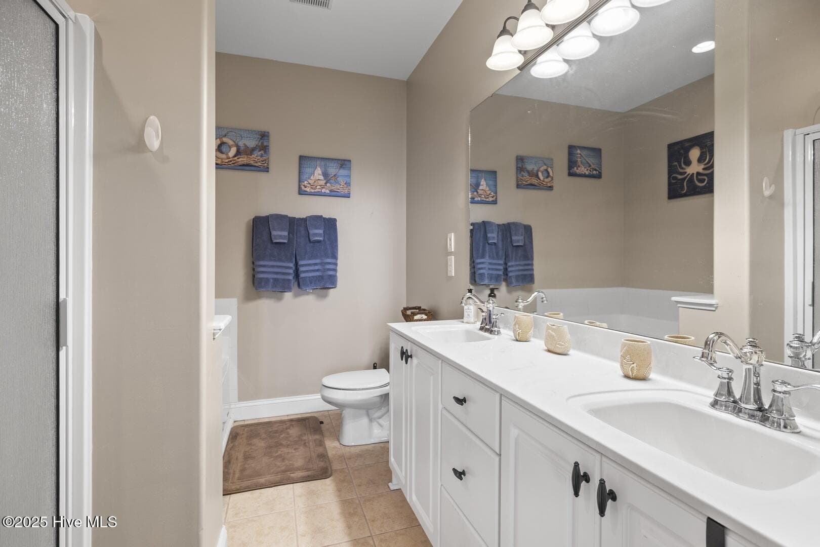 Primary Bath with double vanities, shower and separate tub - 1700 Salter Path Road 202-R, Indian Beach, NC 28512