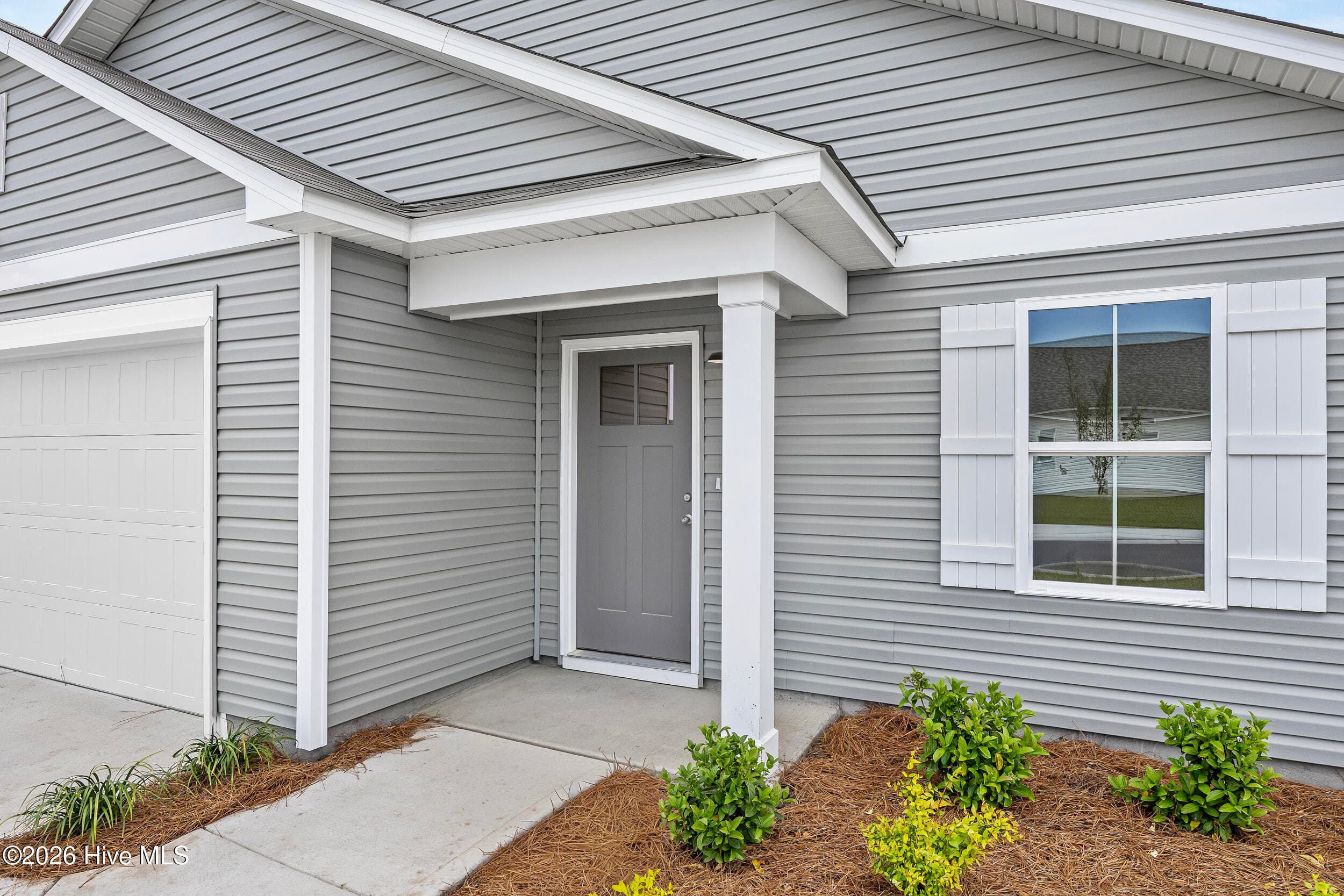 Home shown is a representation of the floor plan and may include optional features or upgrades. Elevations, materials, colors, finishes, square footage, and included features may vary from the actual home. Please consult a Sales Representative for complete details. - 4608 Swimming Lane 53, Shallotte, NC 28470, Shallotte