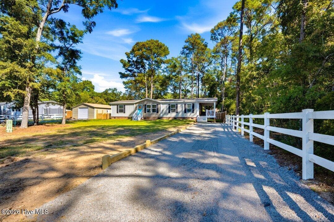 Manufactured Home at 3459 Lakeview Drive SW, Supply, NC 28462, photo 11 of 70