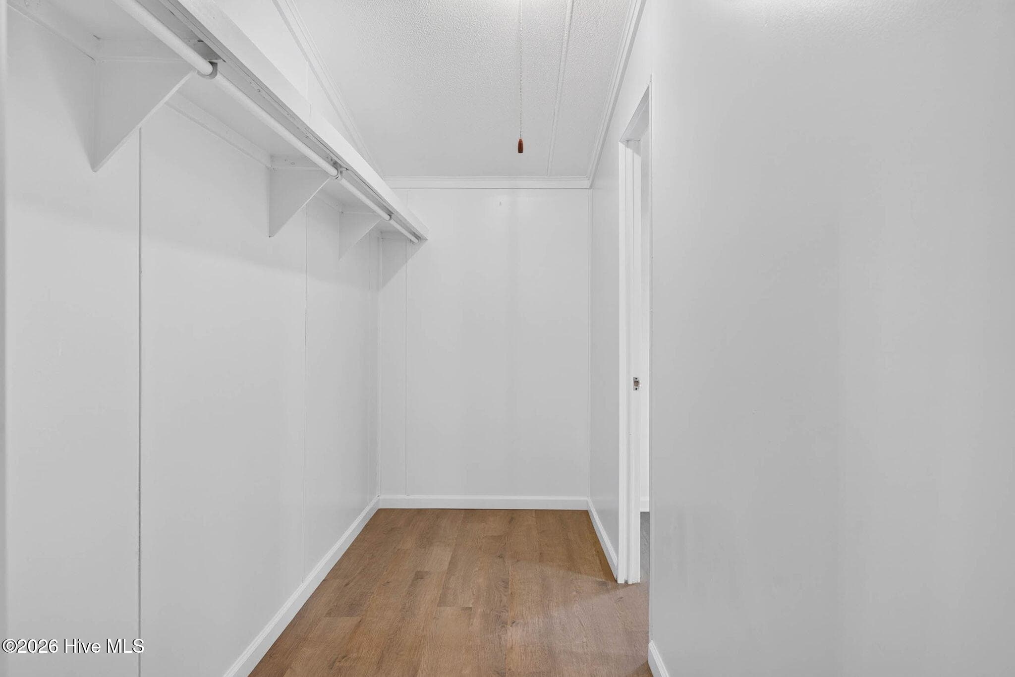 Large walk-in closet provides exceptional storage with plenty of room to keep your wardrobe organized. - 1199 Zack Street SE, Bolivia, NC 28422