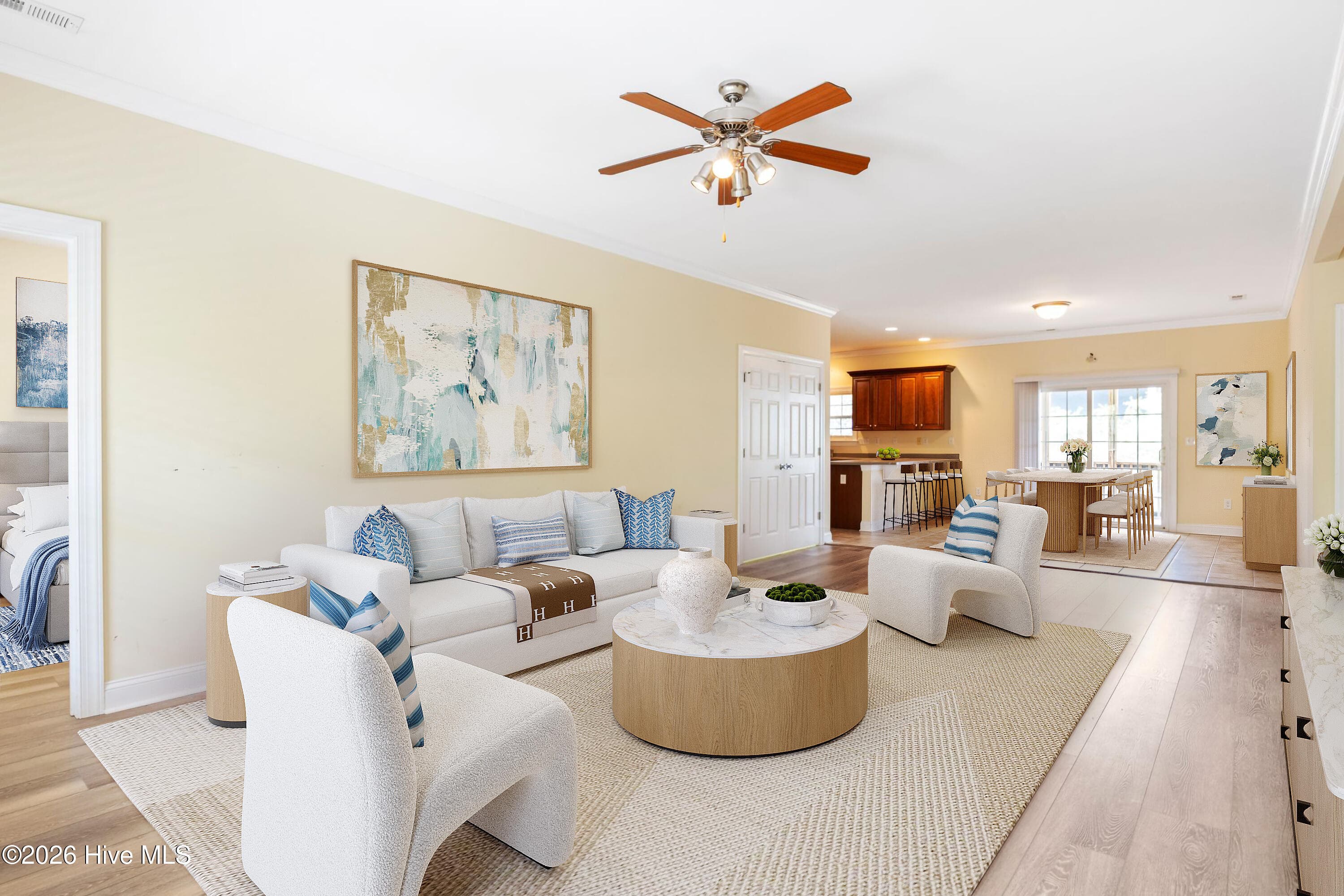 VIRTUAL STAGING of Living Room looking toward Dining Room and Kitchen - 225 NE 39th Street, Oak Island, NC 28465