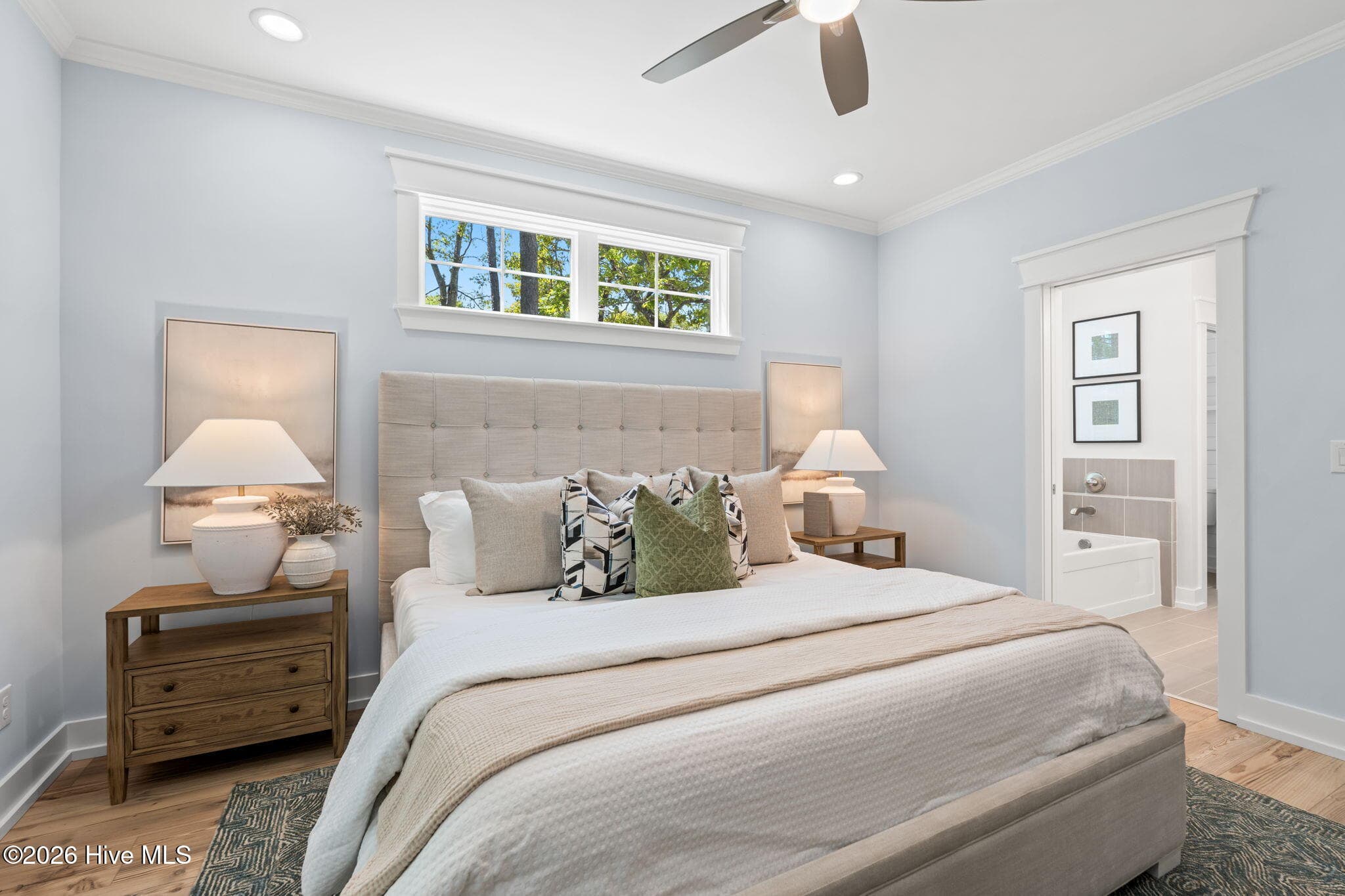 Photos of a staged model of the exact same plan - 312 NE 58th Street, Oak Island, NC 28465