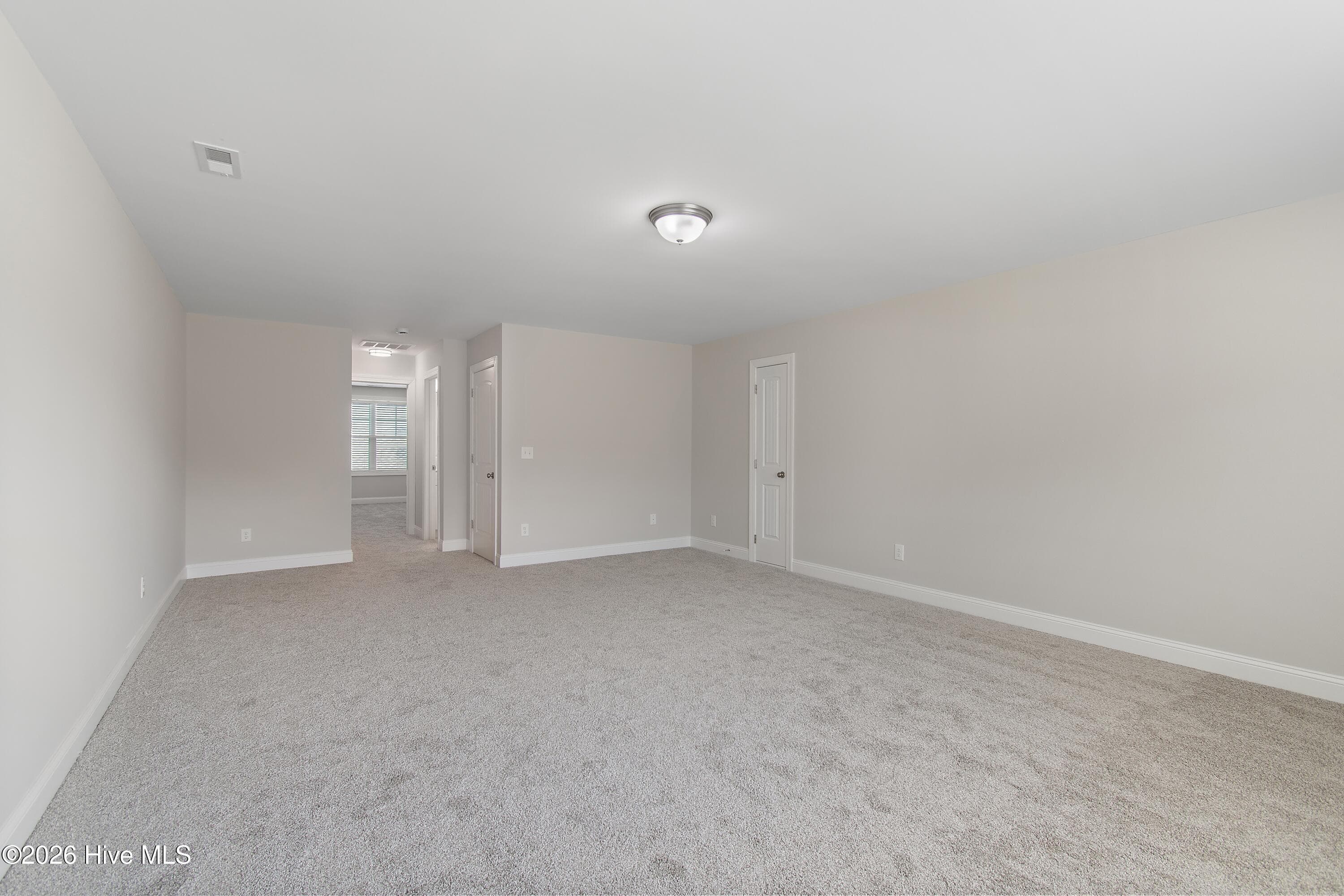 Upstairs media room. Just finished in 2026. - 1674 Back Bay Drive SW, Shallotte, NC 28470