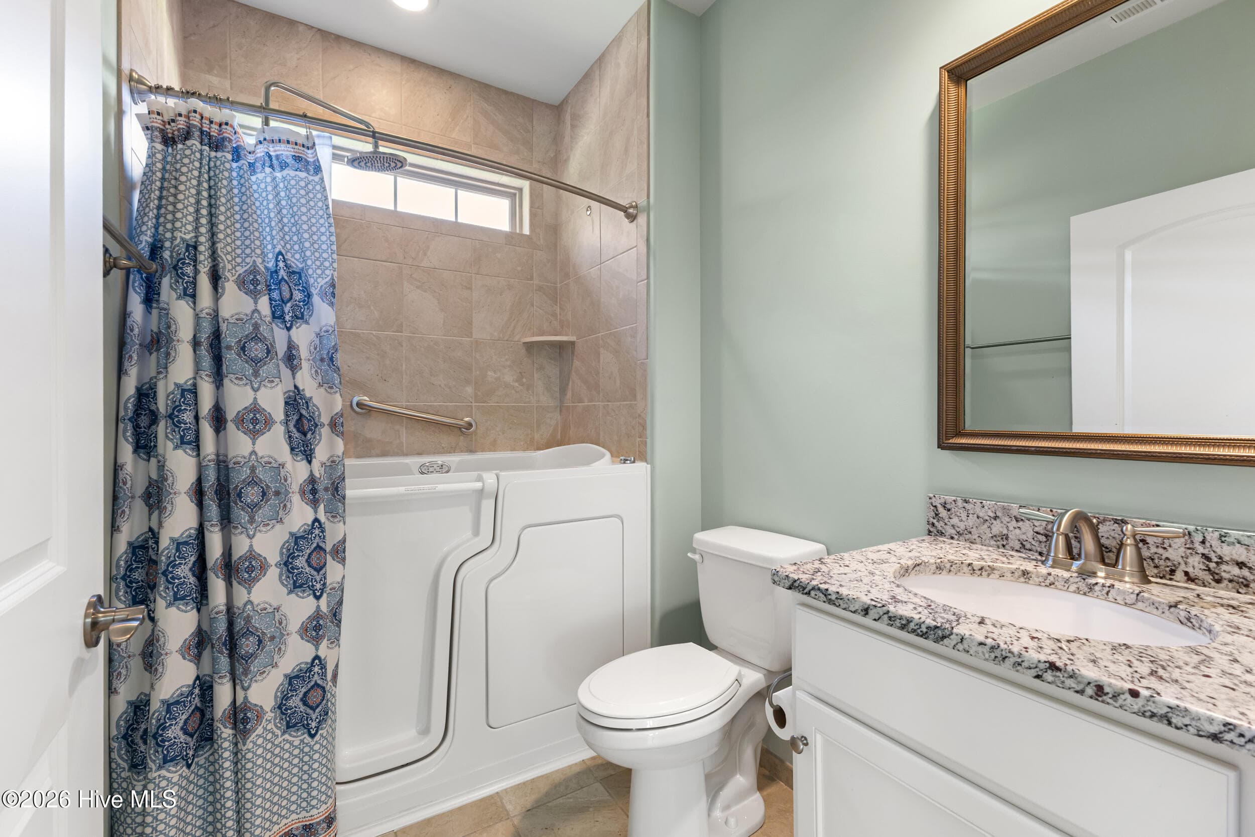 guest bathroom with zero entry therapy tub- BRAND NEW - 615 Jenoa Drive, Castle Hayne, NC 28429
