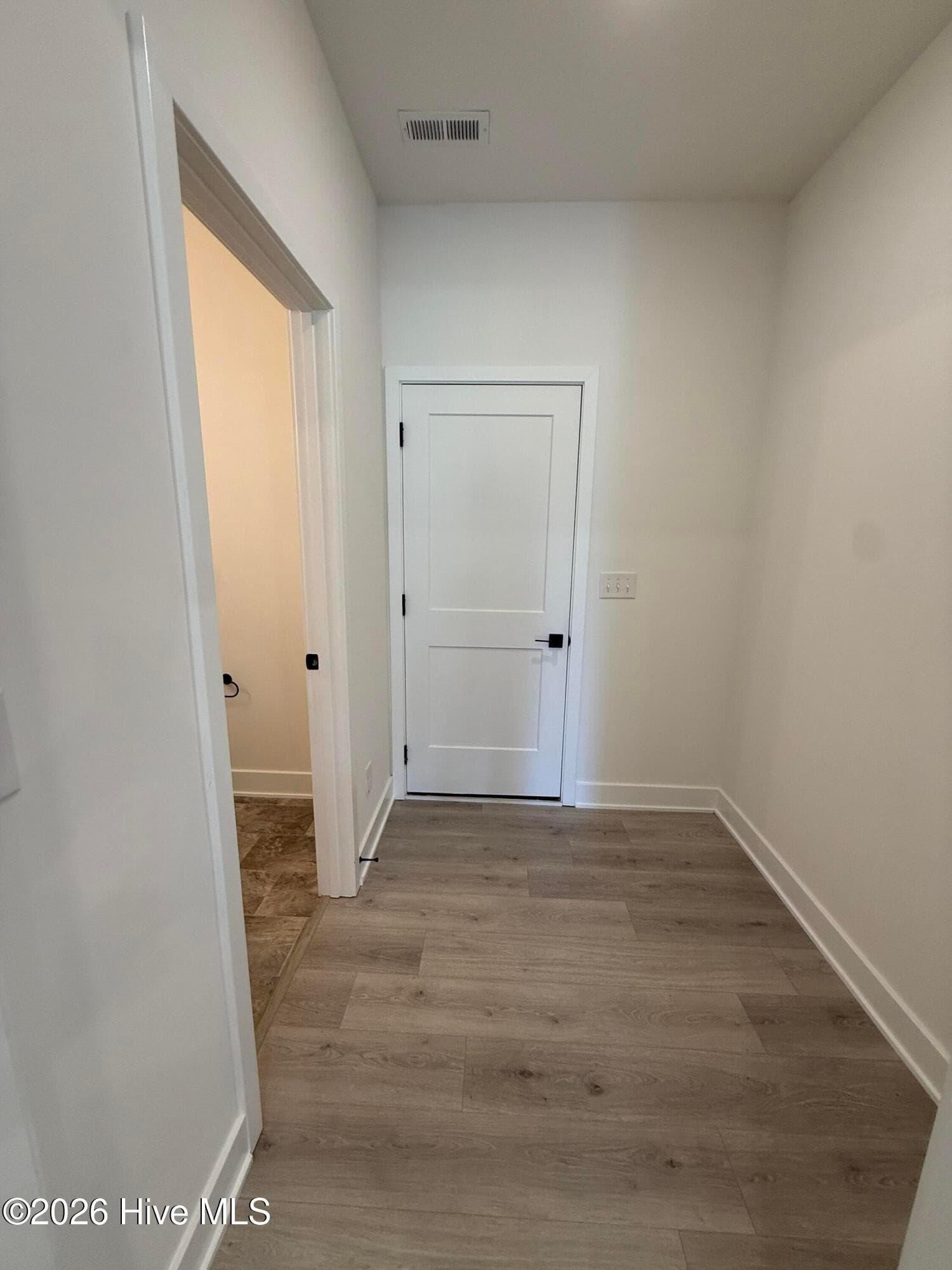 Representative photo Drop zone between Garage and kitchen with half bath - 2129 Sandbrook Loop, Leland, NC 28451