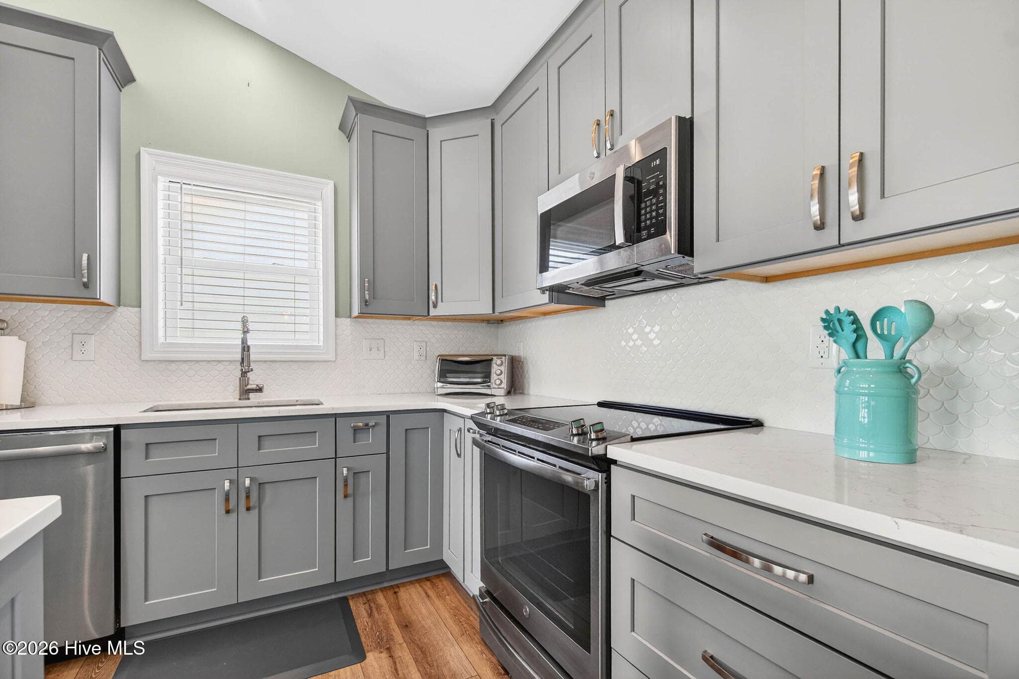 Abundant soft closing cabinetry to accommodate all your essentials. - 1125 S Topsail Drive, Surf City, NC 28445