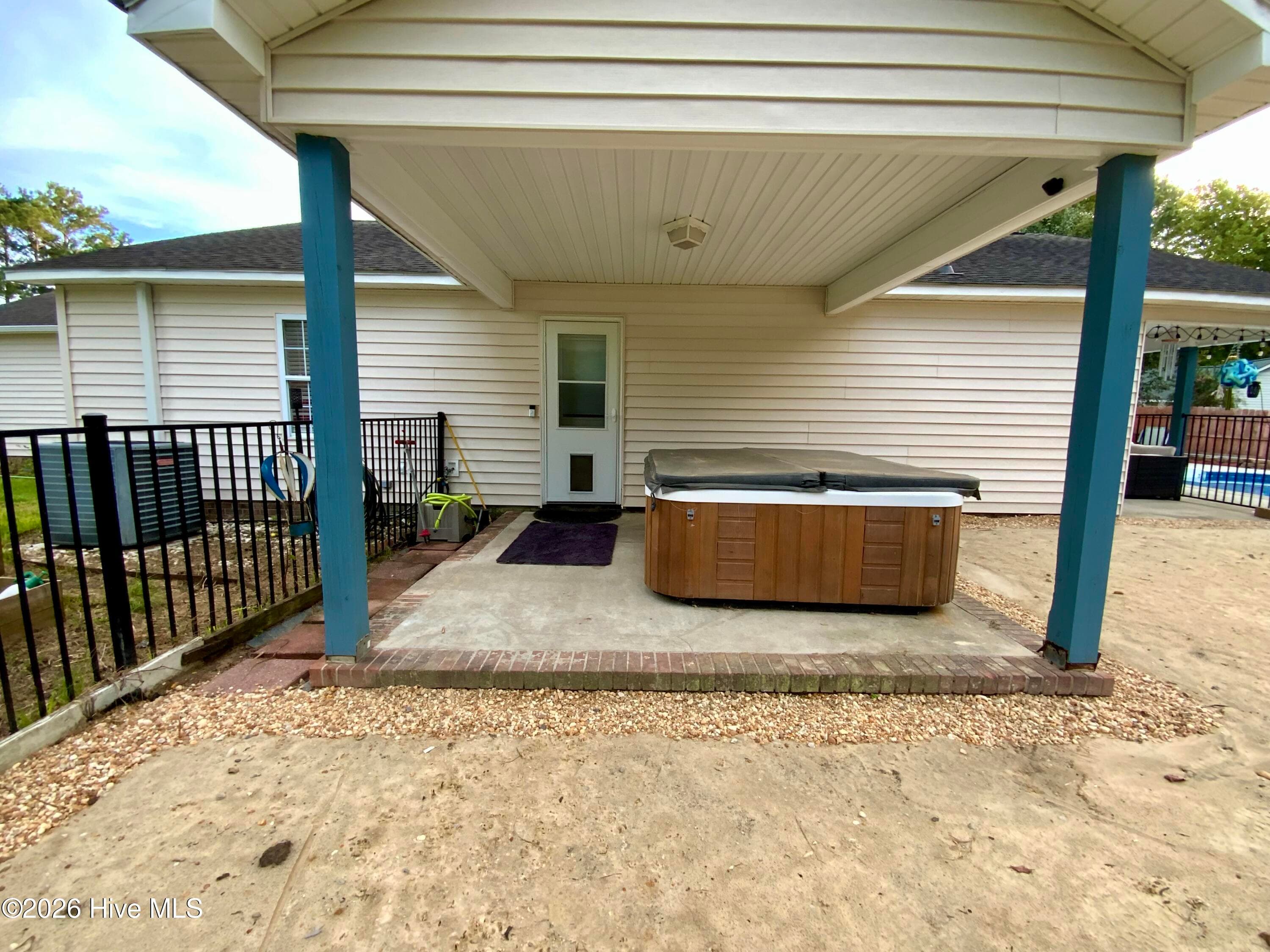 Back door leads to primary bedroom. - 102 Donna Court, Hubert, NC 28539