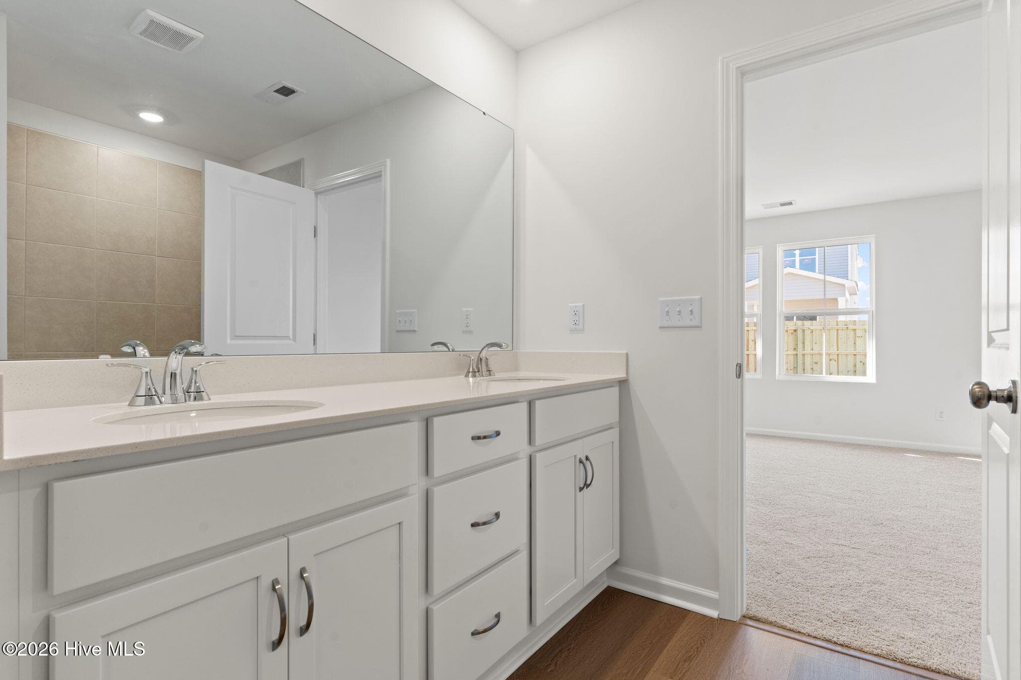 Home shown is a representation of the floor plan and may include optional features or upgrades. Elevations, materials, colors, finishes, square footage, and included features may vary from the actual home. Please consult a Sales Representative for complete details. - 770 Pelican Cove Way SE 301, Southport, NC 28461