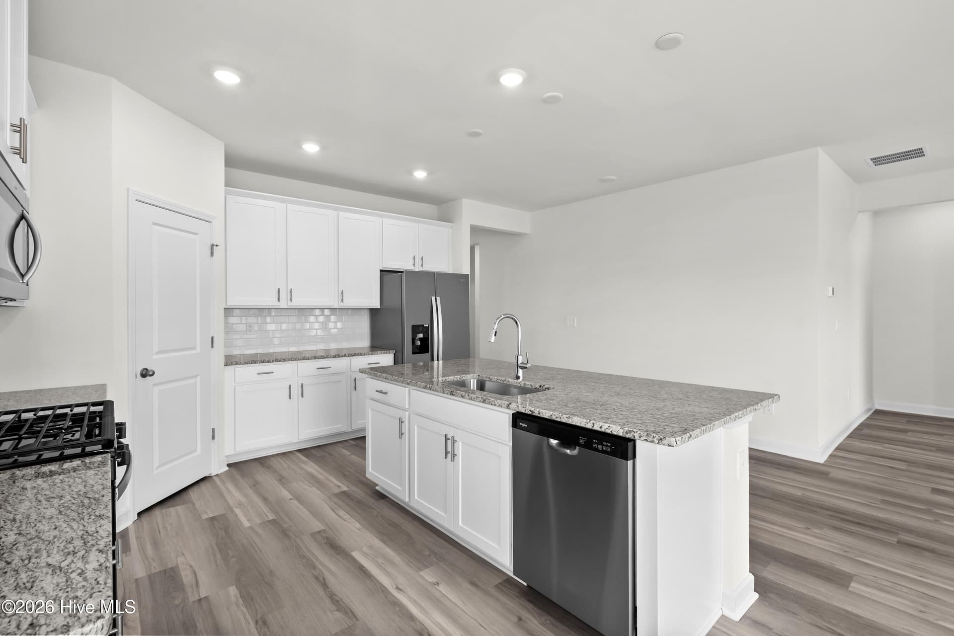 Photo is not of the actual home, but is an example photo of a completed home and may depict options and/or features that are not included - 4154 Generations Circle NW, Ash, NC 28420