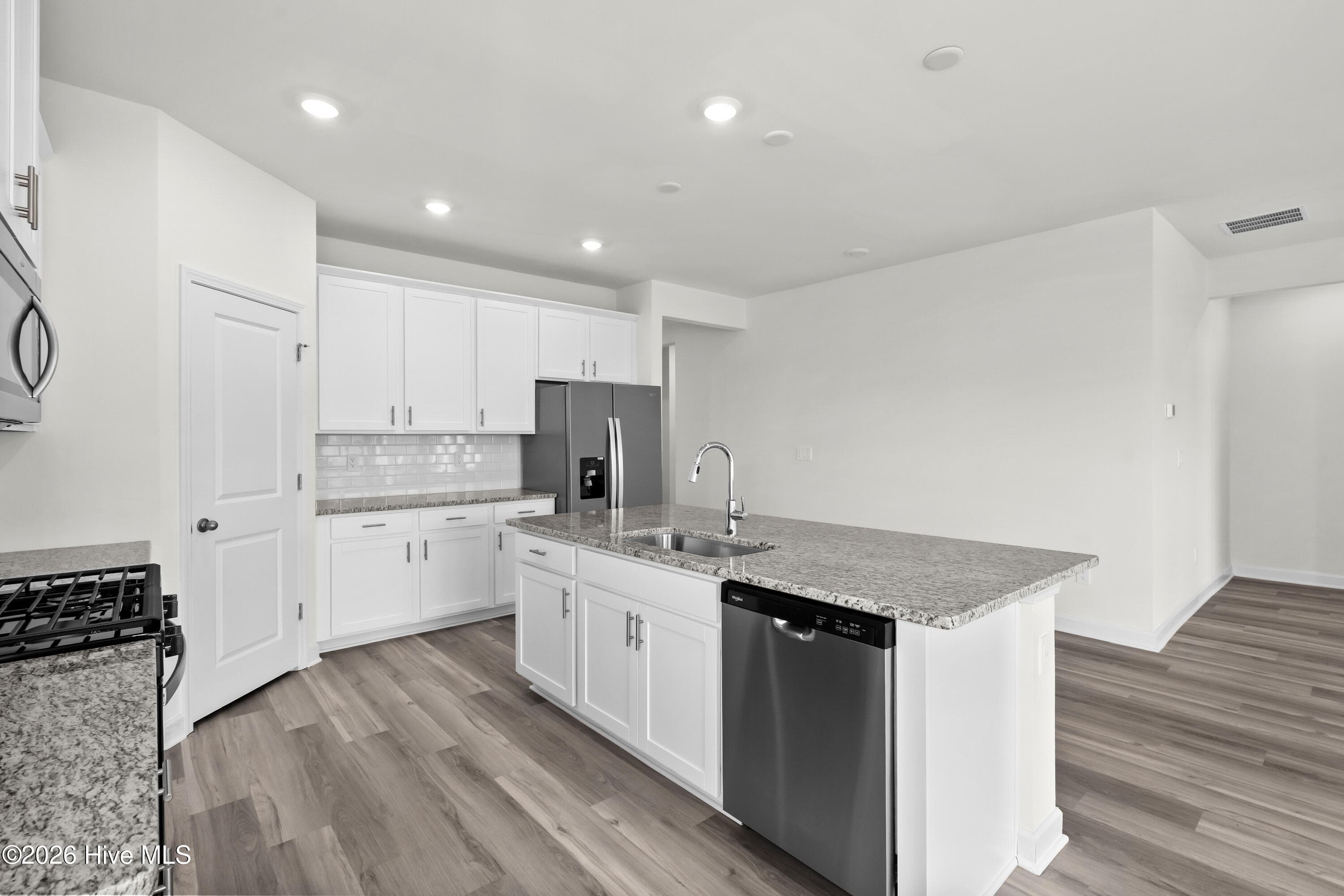 Photo is not of the actual home, but is an example photo of a completed home and may depict options and/or features that are not included - 4154 Generations Circle NW, Ash, NC 28420