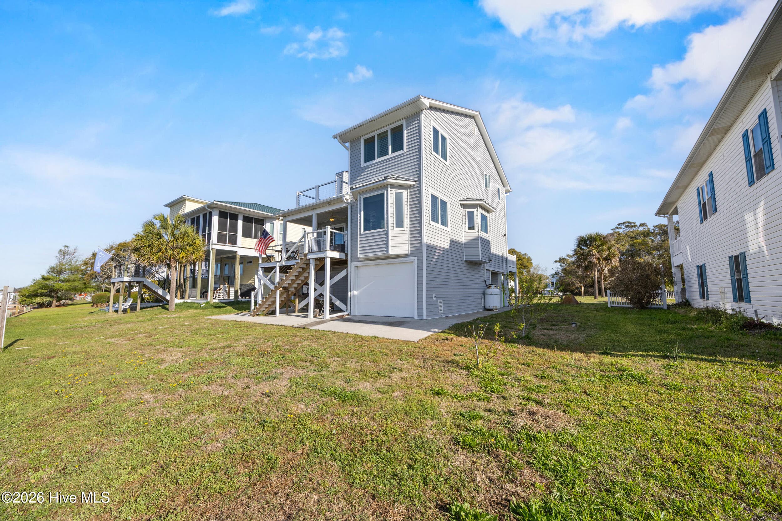 Single Family Residence at 103 E Island Drive, Oak Island, NC 28465, photo 83 of 118