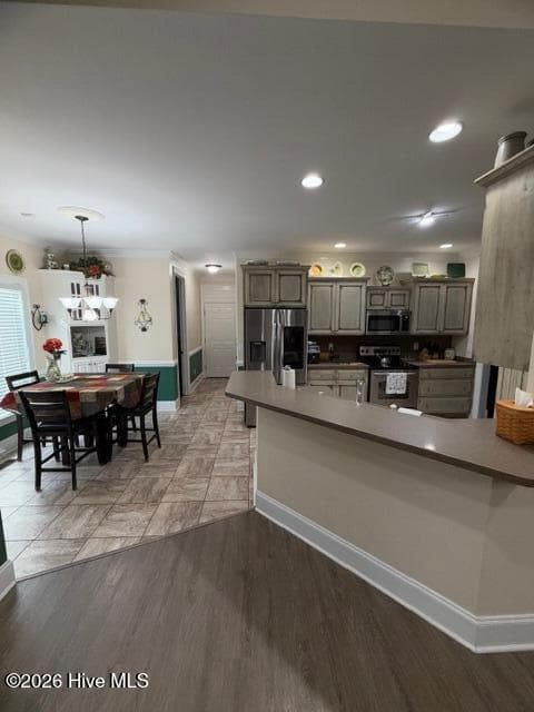 View from Great Room to Breakfast Nook & Kitchen - 138 Trestle Street, Hamlet, NC 28345