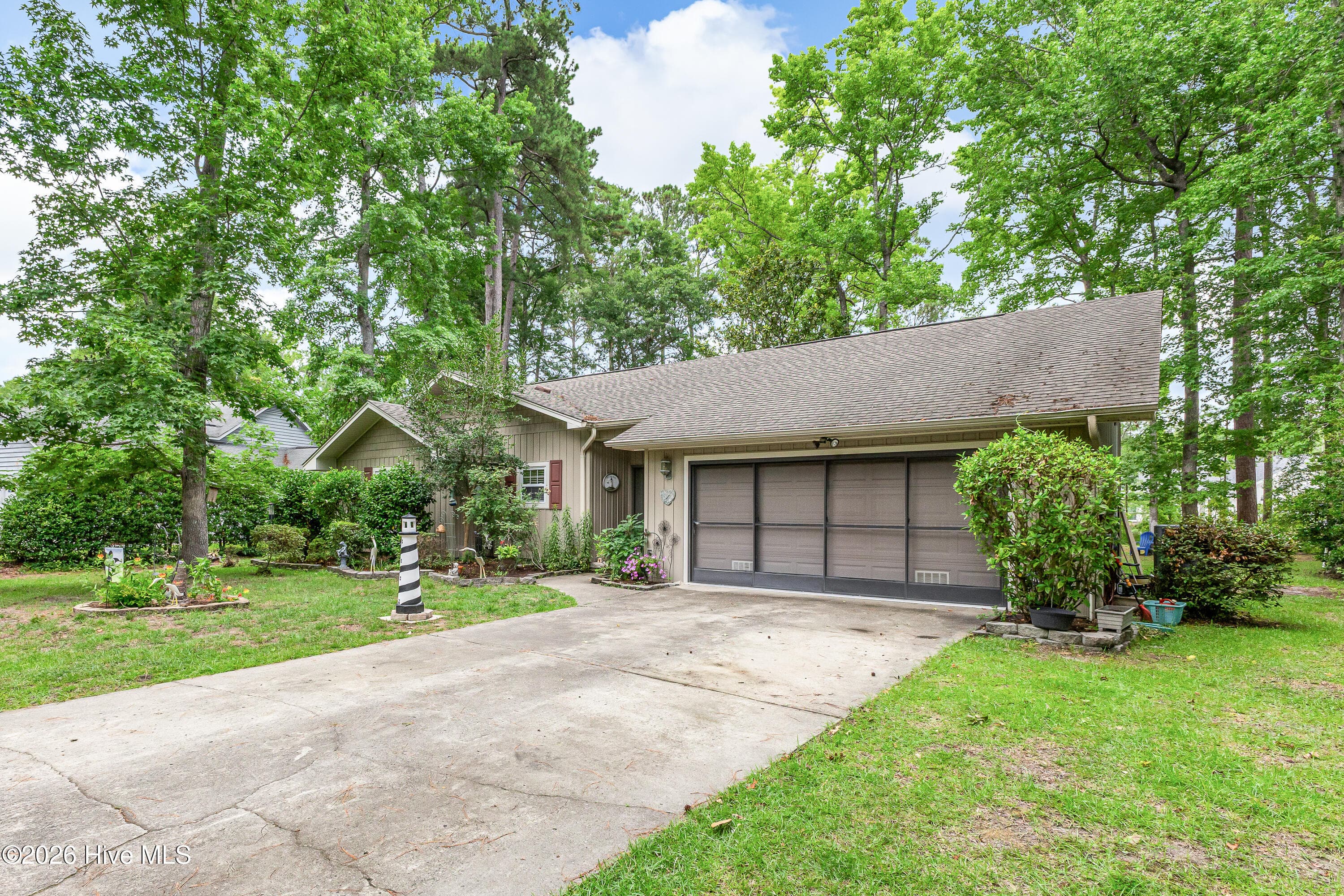 Single Family Residence at 5 Topsail Court, Carolina Shores, NC 28467, photo 3 of 46
