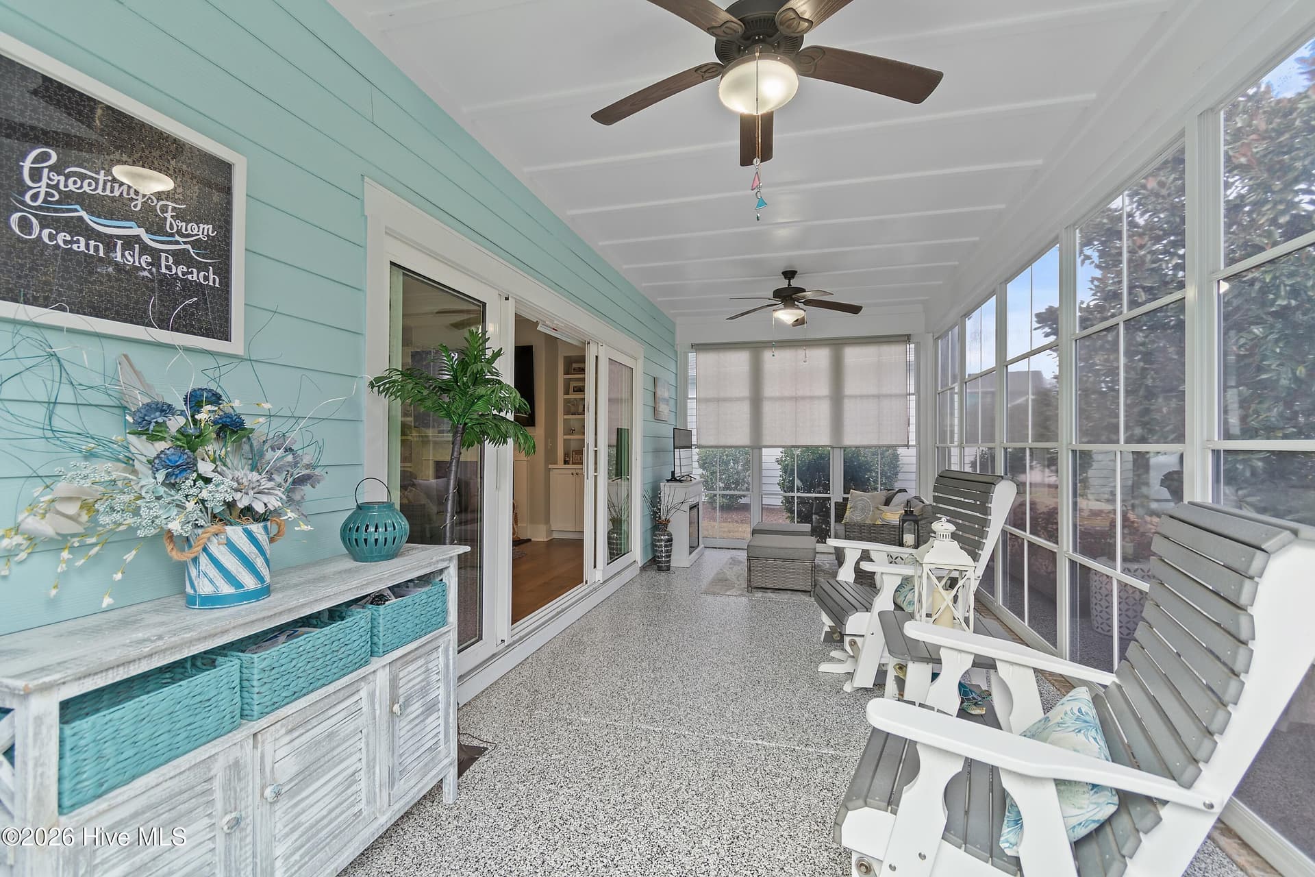 Large EZ Breeze patio with epoxy floors. - 6358 Bryson Drive SW, Ocean Isle Beach, NC 28469