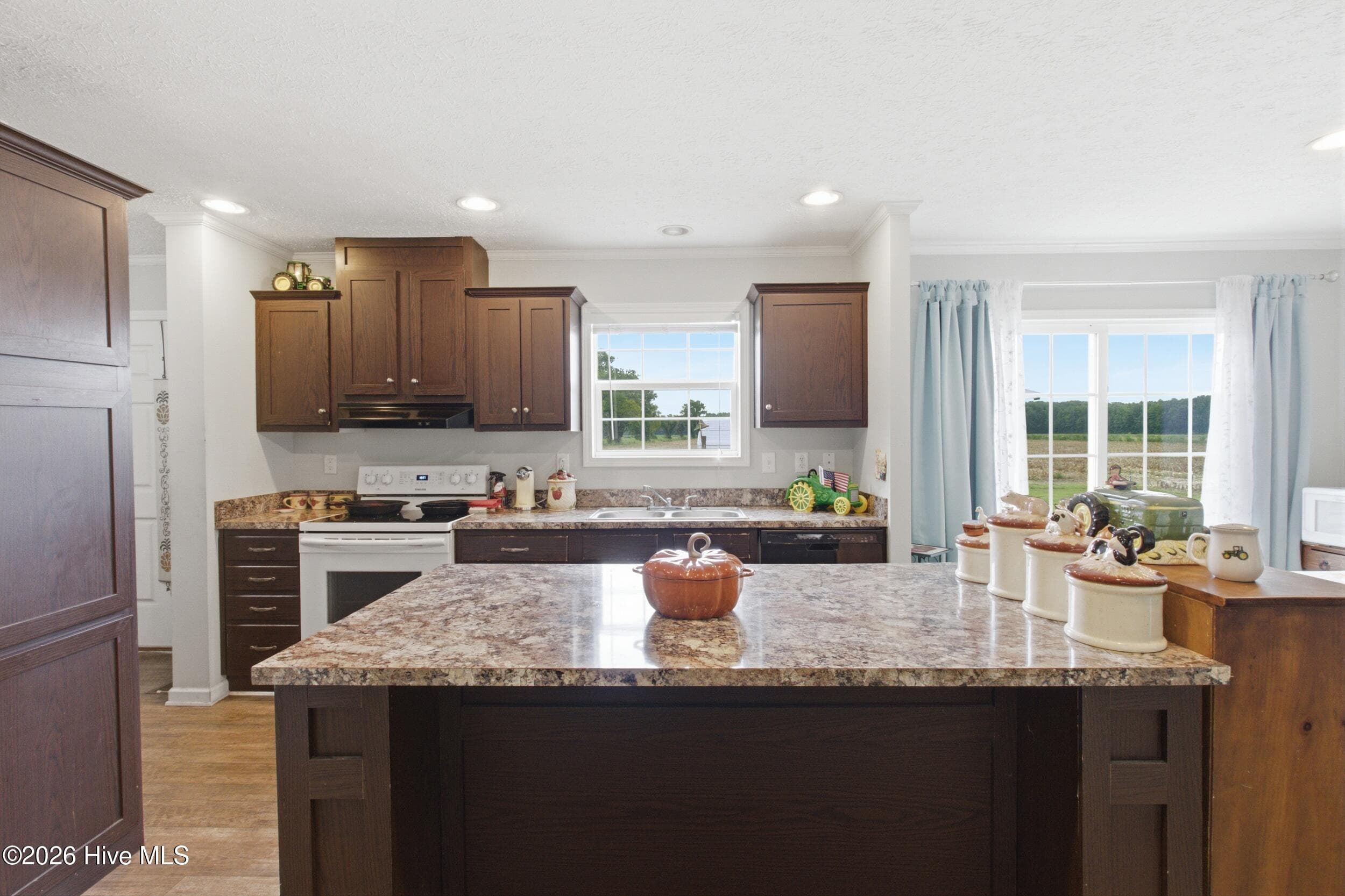 Kitchen with large island with bar for seating - 1230 Beech Springs Road, Tyner, NC 27980