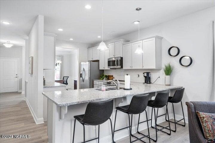1727 - Photos of the same plan in a different community. - 100 Shoal Lane, New Bern, NC 28562