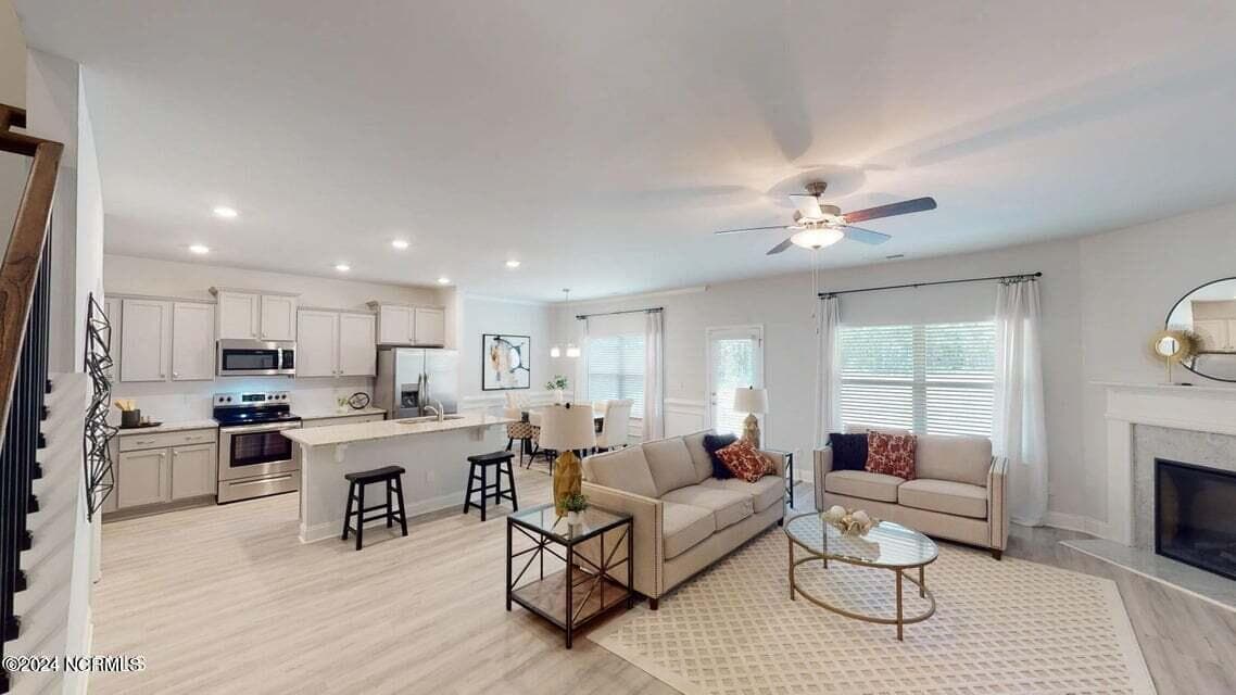 “Photo is of the same floorplan in a different community. Colors and selections may vary.” - 1901 Caracara Drive, New Bern, NC 28560
