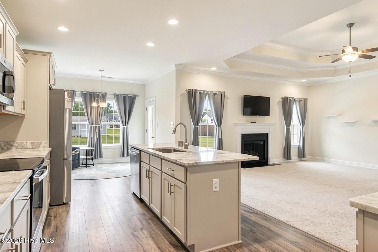 Kitchen open to all the family with walls just painted alabaster white - 2019 Tarpon Trail, New Bern, NC 28562