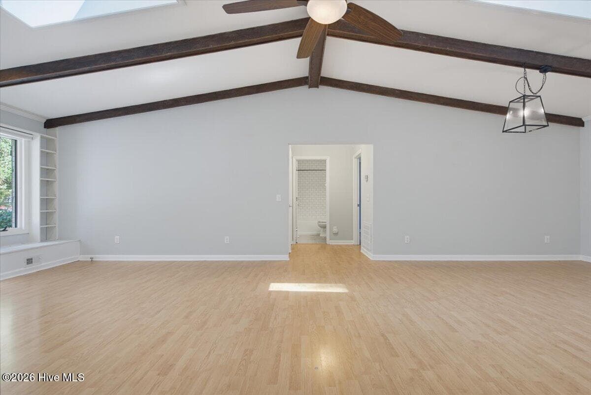 Living room with beams and vaulted ceiling - 55 Salem Drive, Pinehurst, NC 28374