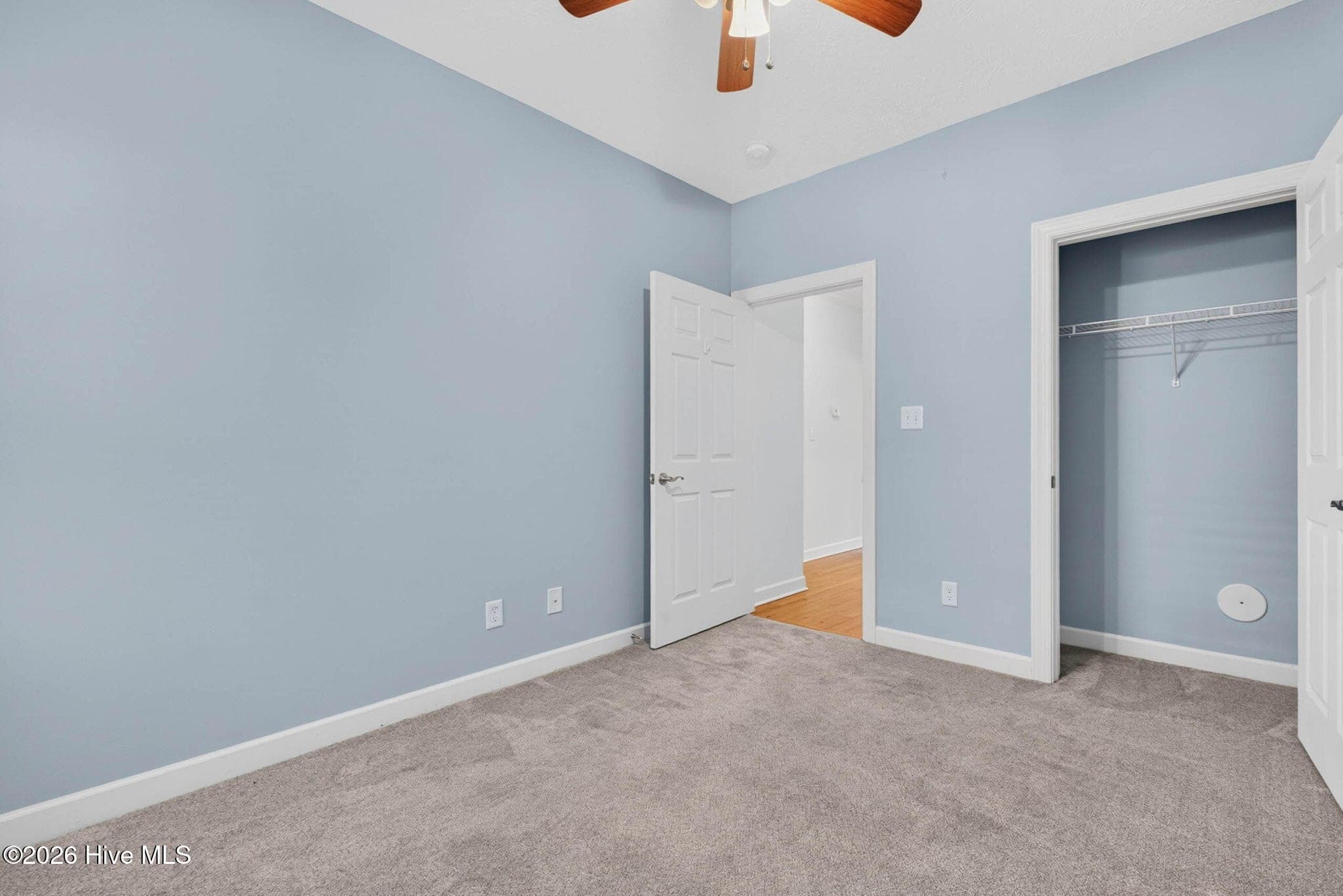 Second bedroom showing closet - 7825 High Market Street #303, Sunset Beach, NC 28468