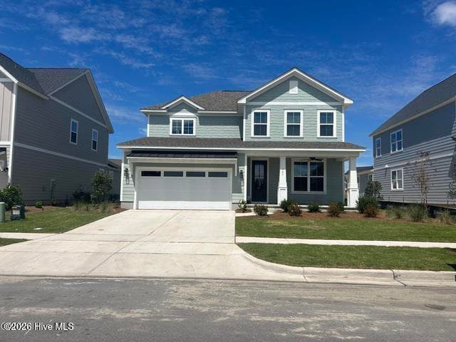 Not exact home - Previously built Camellia floorplan. - 5202 Moonshell Loop, Wilmington, NC 28412