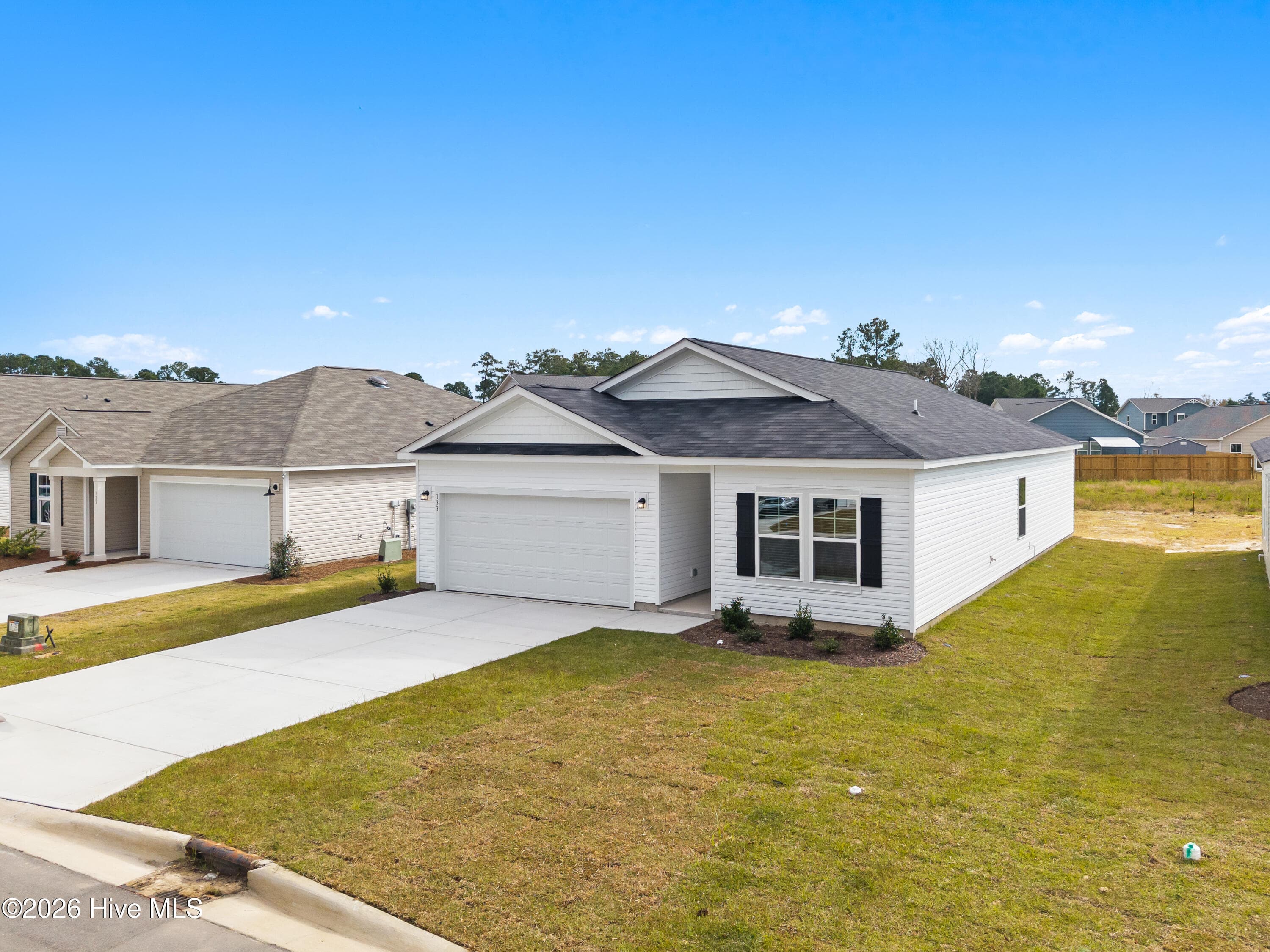Under construction with estimated completion in June. Photos are representative of a similar home. Features, layout, and finishes may vary. Contact listing agent for details. - 217 Keira Lane NW, Supply, NC 28462