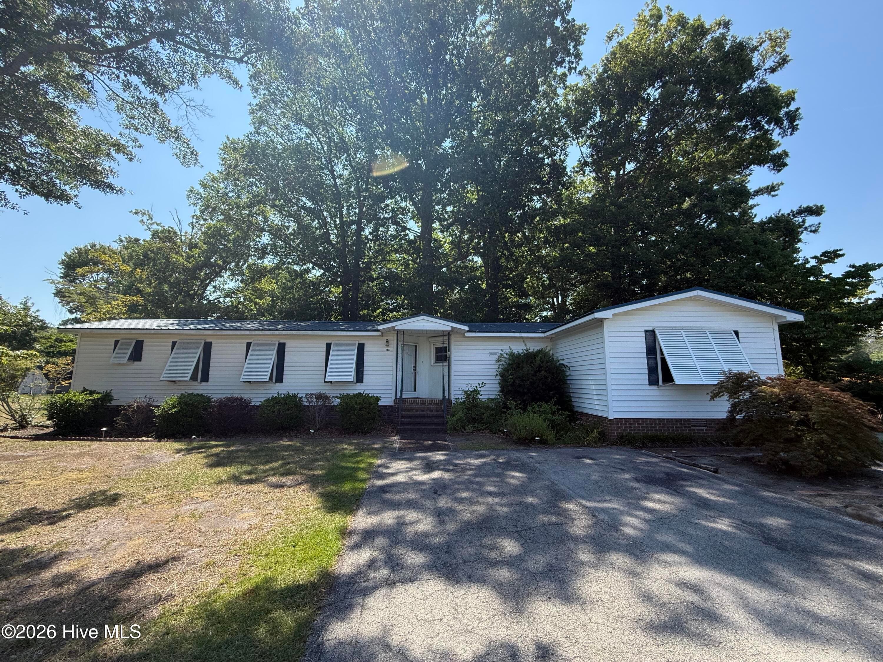 Manufactured Home at 114 Lejeune Road, Cape Carteret, NC 28584, photo 2 of 57