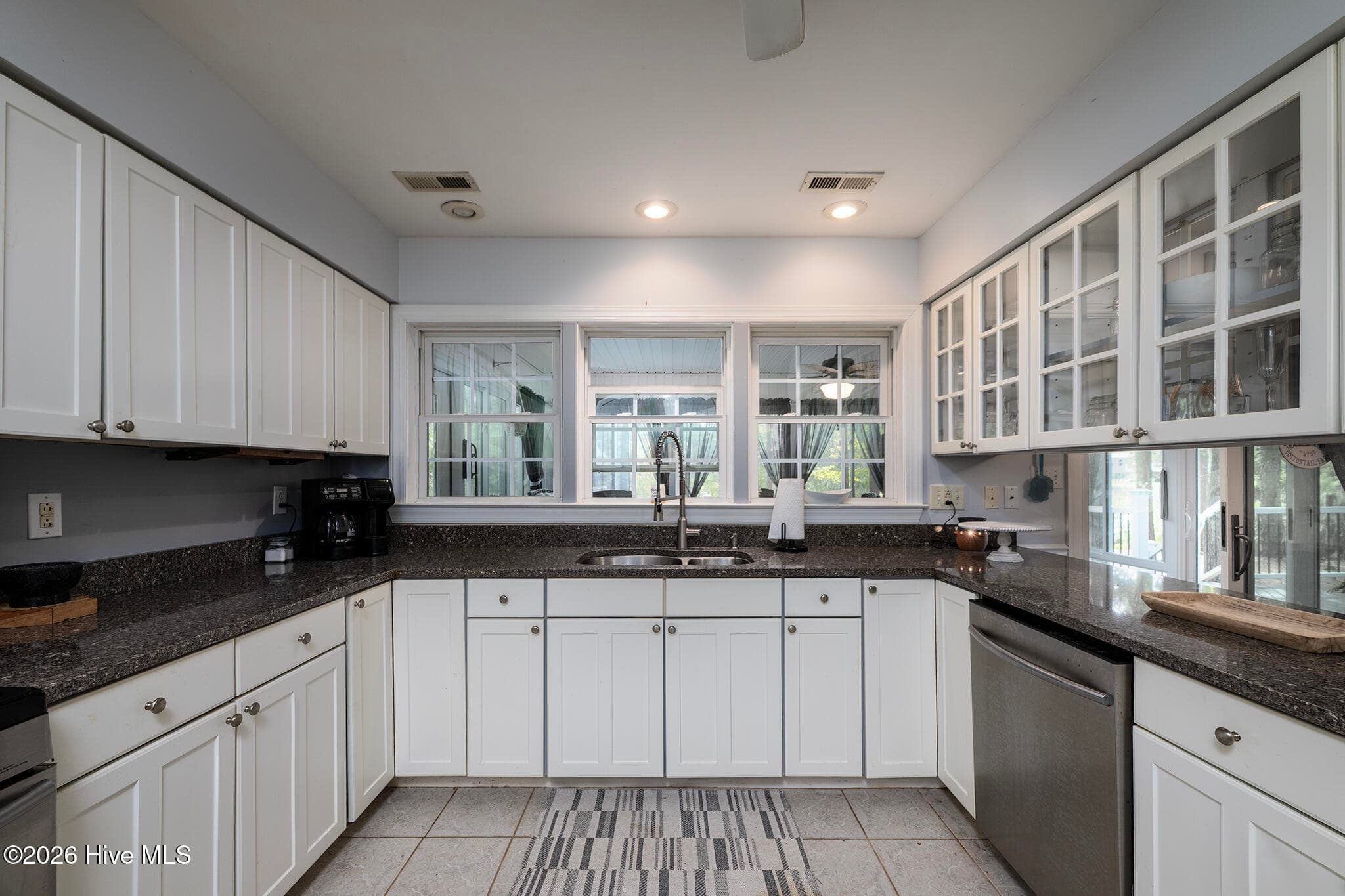 Kitchen with Plenty Work Space on the Stone Countertops - 106 Windlass Way, Aurora, NC 27806