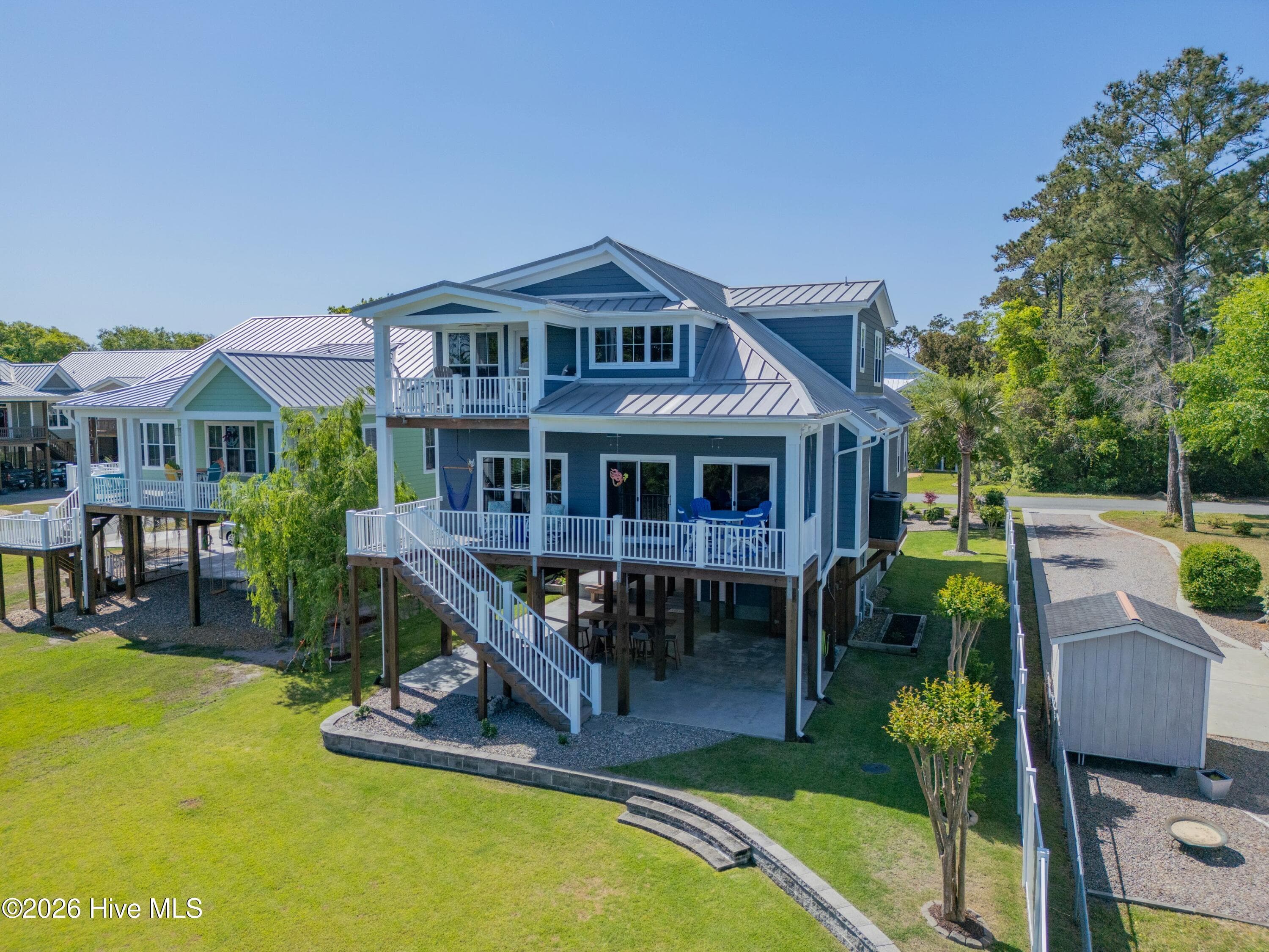 Single Family Residence at 6308 E Yacht Drive, Oak Island, NC 28465, photo 2 of 67