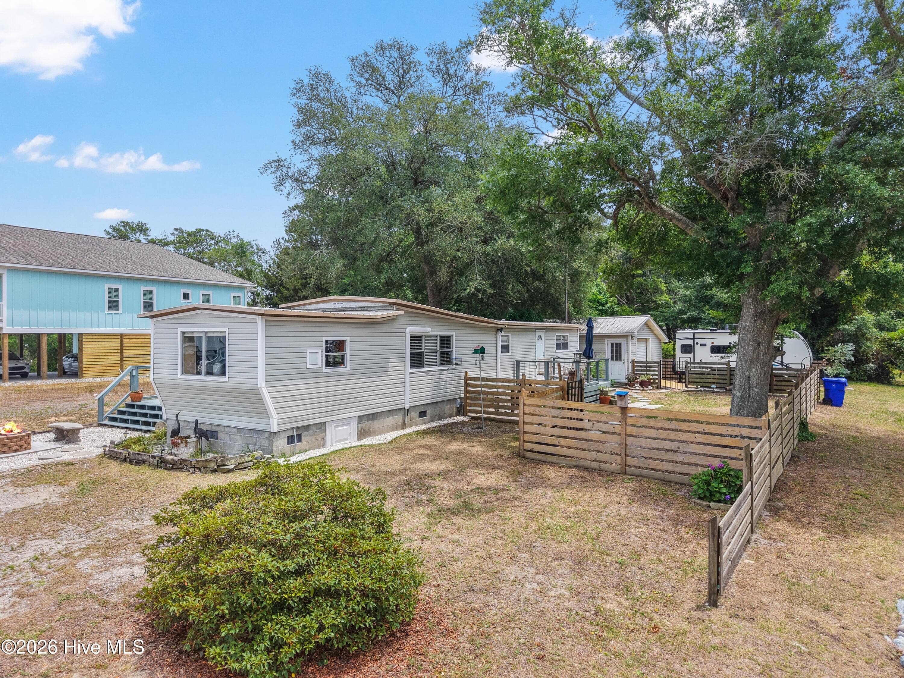 Manufactured Home at 7701 E Yacht Drive, Oak Island, NC 28465, photo 7 of 69