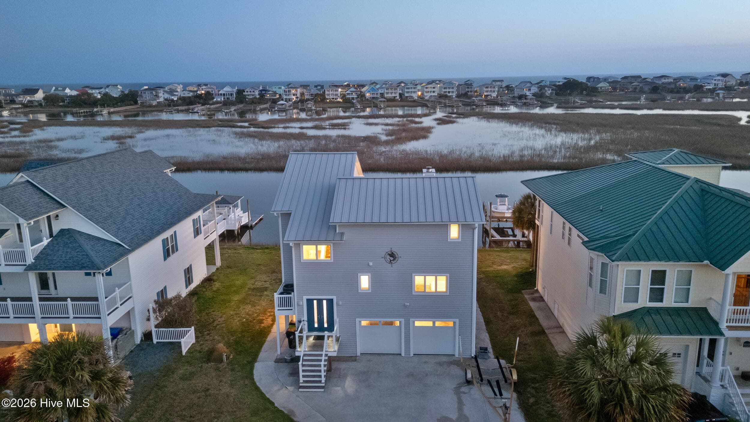 Single Family Residence at 103 E Island Drive, Oak Island, NC 28465, photo 98 of 118