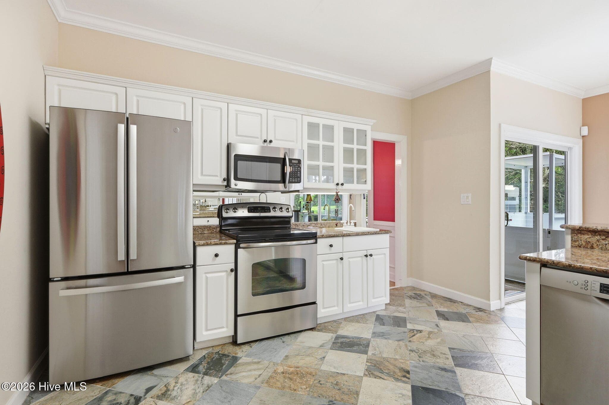 Kitchen, entry to dining area, and wet bar area - 104 Talford Drive, Atlantic Beach, NC 28512
