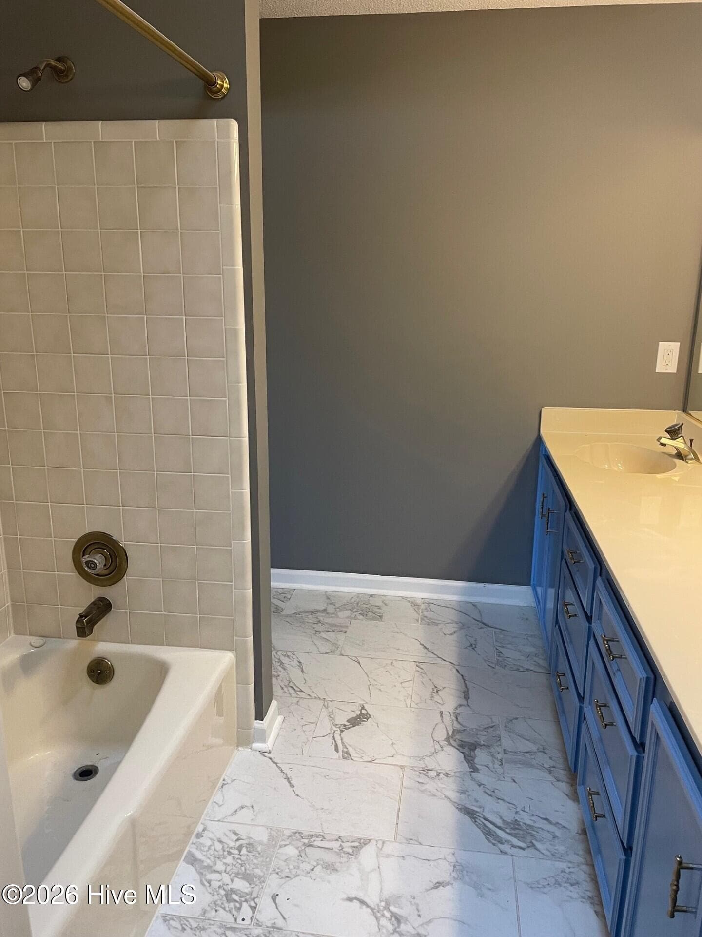 Bathroom with freshly painted cabinets, tile floor. - 4164 Quail Springs Circle, Augusta, GA 30907