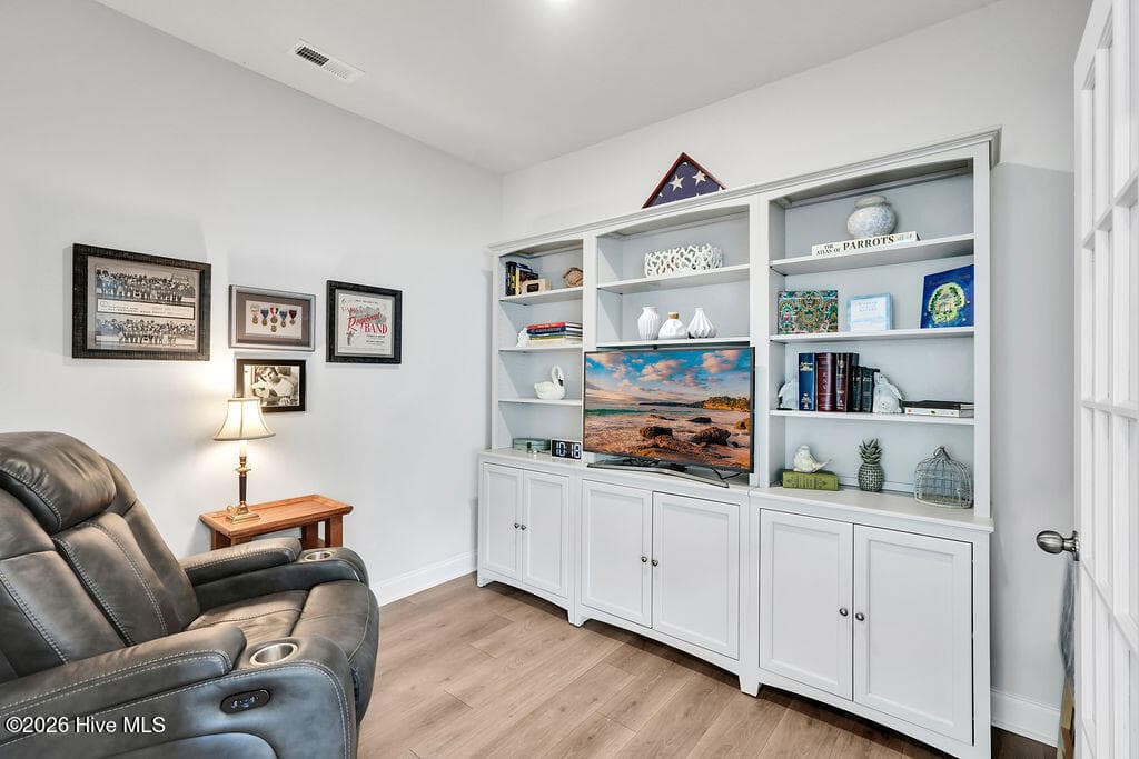 Just off of the living room, this flex room makes a great study, office, playroom, media room, exercise or craft room. - 142 Rice Marsh Way, Wilmington, NC 28412