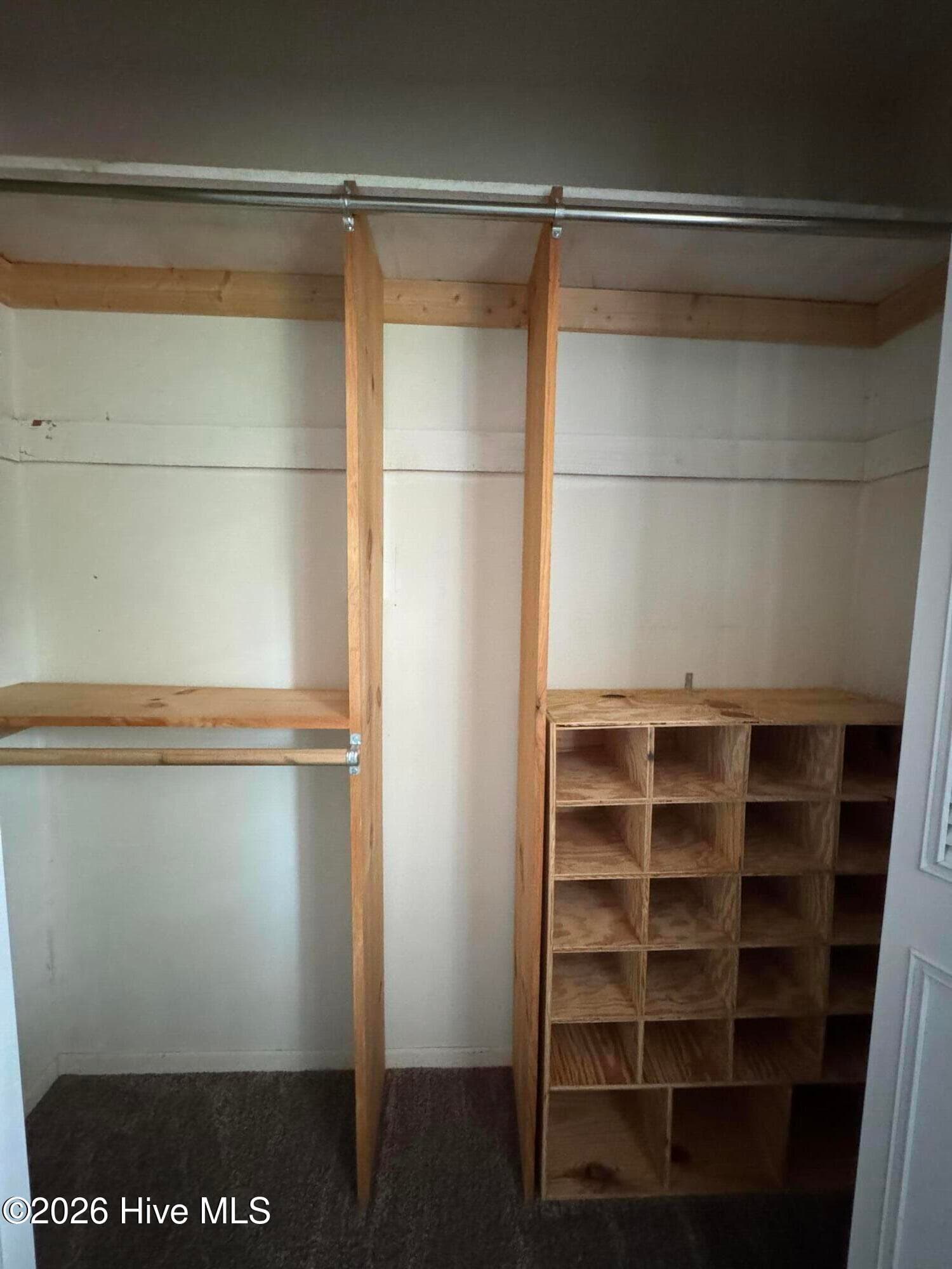 This Bedroom is the 'Guest Room'. For their comfort it has shirt-pants/dresses-shoes-and longer items accessibility built in. - 118 Oakwood Drive, Havelock, NC 28532